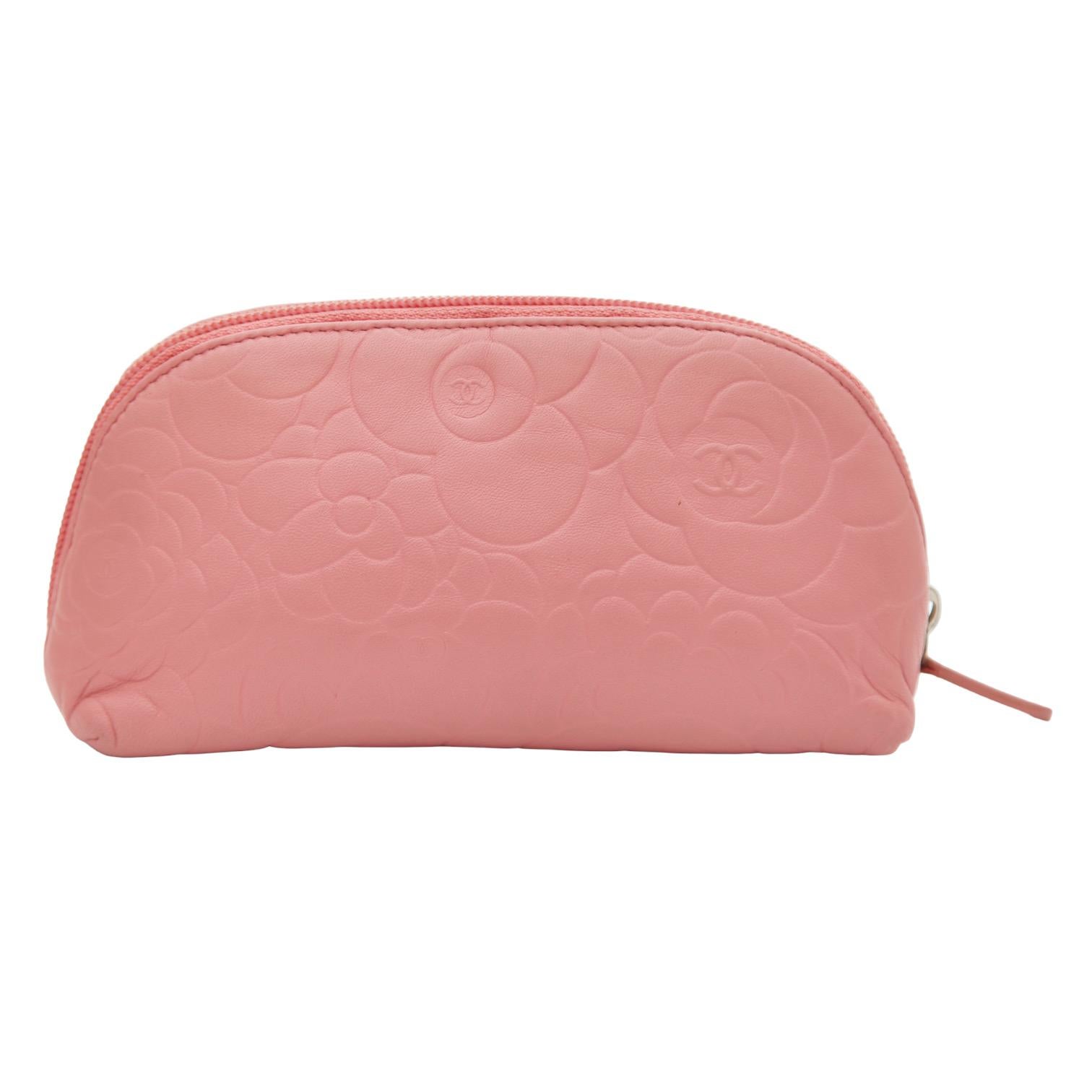 GUARANTEED AUTHENTIC CHANEL PINK LAMBSKIN LEATHER COSMETIC POUCH


Design: 
  - Pink lambskin leather exterior.
   - Camellia embossed print.
  - Silver-tone CC logo at front.
  - Zip around closure.
  - Interior lined in pink textile.
  - Interior