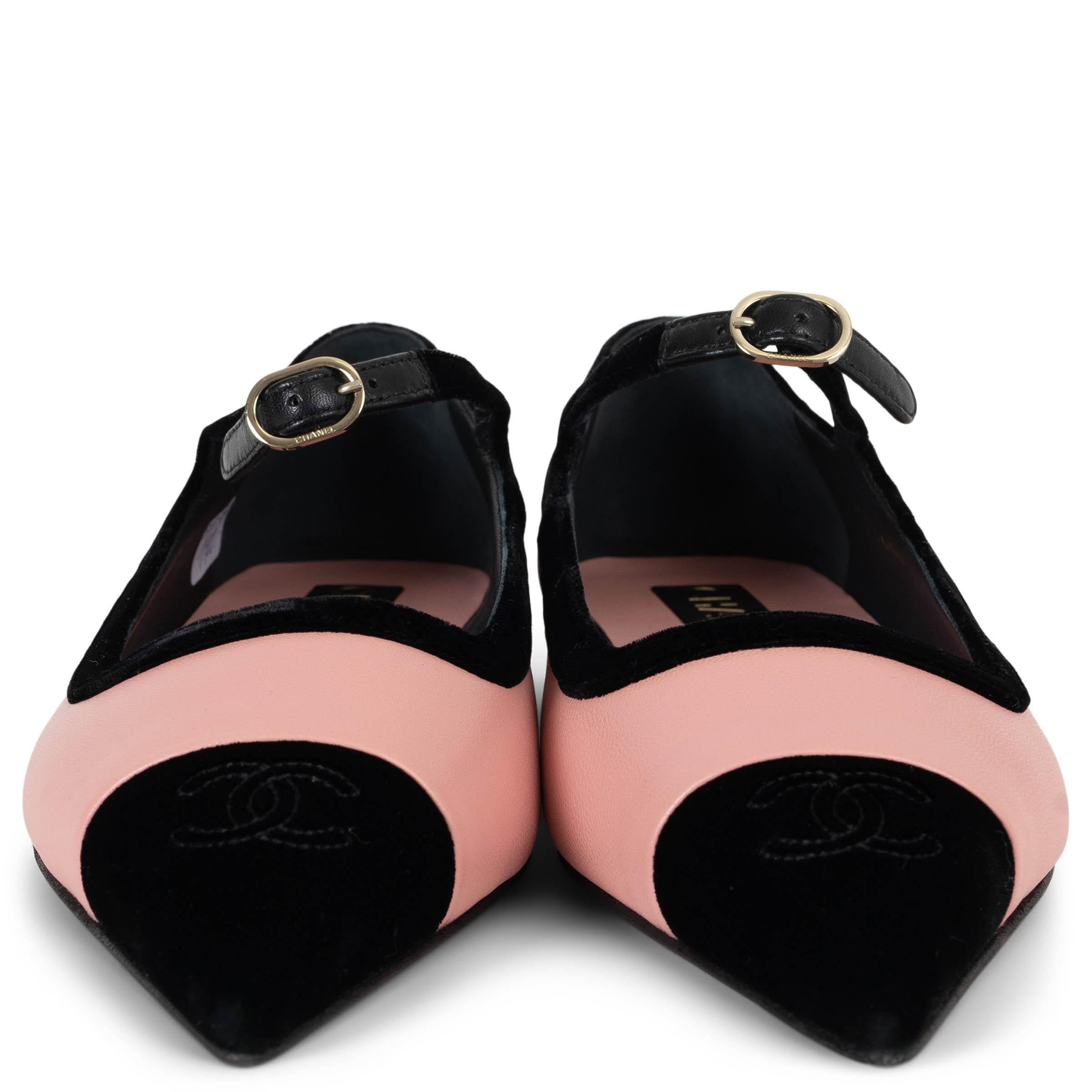 This 100% authentic Chanel Mary-Jane ballet flats in pink lambskin leather exude timeless elegance with a refined contrast. Designed with black velvet trims and a matching toe cap, they feature a chic pointed-toe silhouette. A pearly white resin