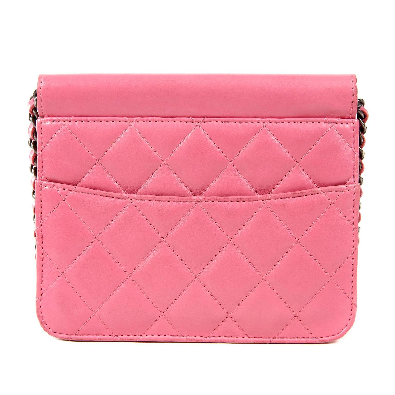 Chanel Pink Leather Mini Flap Bag- PRISTINE unworn condition
The crossbody style holds just the essentials for day or evening yet elevates any ensemble effortlessly. 
Taffy pink leather is quilted in signature Chanel diamond pattern.  Large