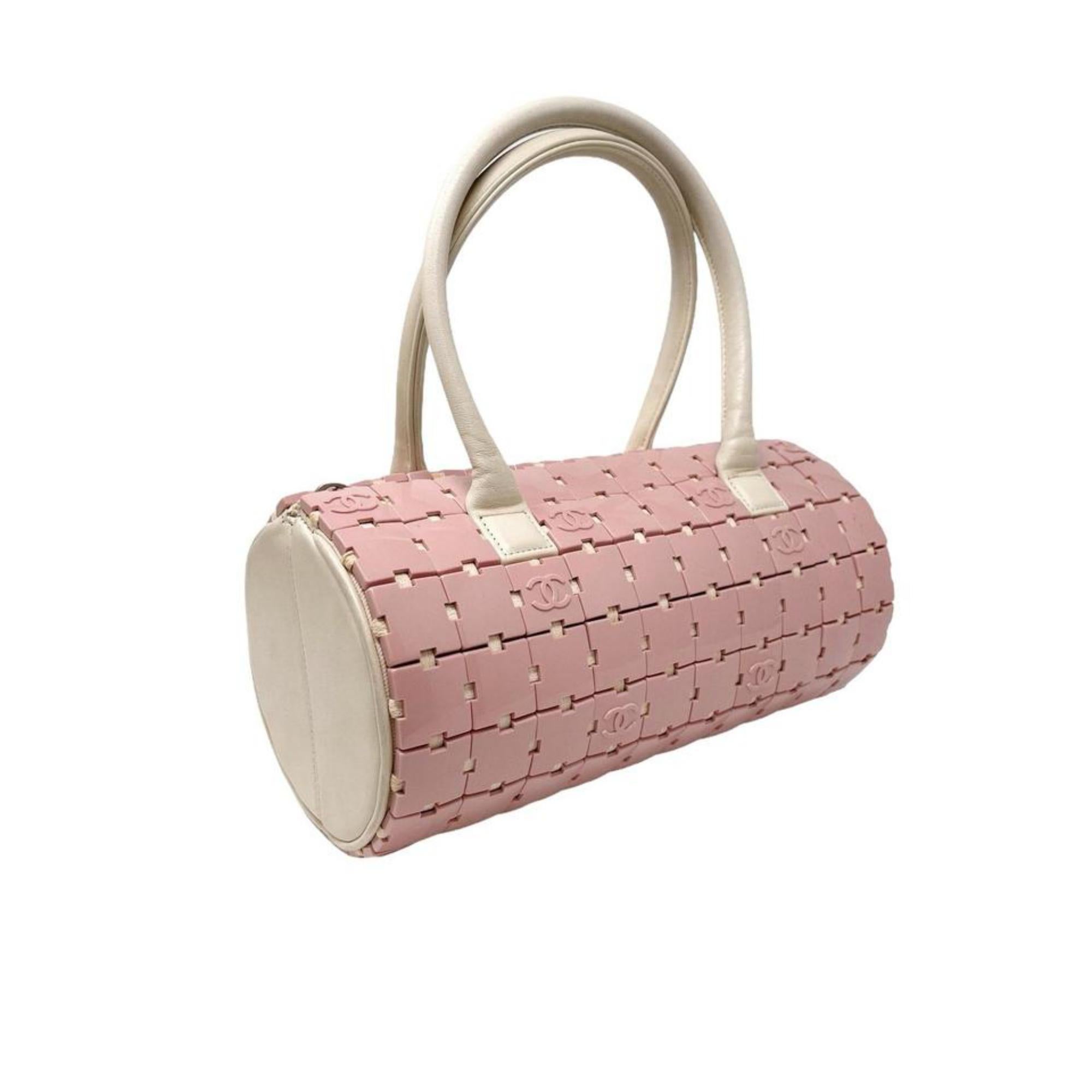 Chanel Pink Lucite CC Logo Block Puzzle Cylinder Barrel Bag 30cz413s
Date Code/Serial Number: 6779362
Made In: France
Measurements: Length:  10.5