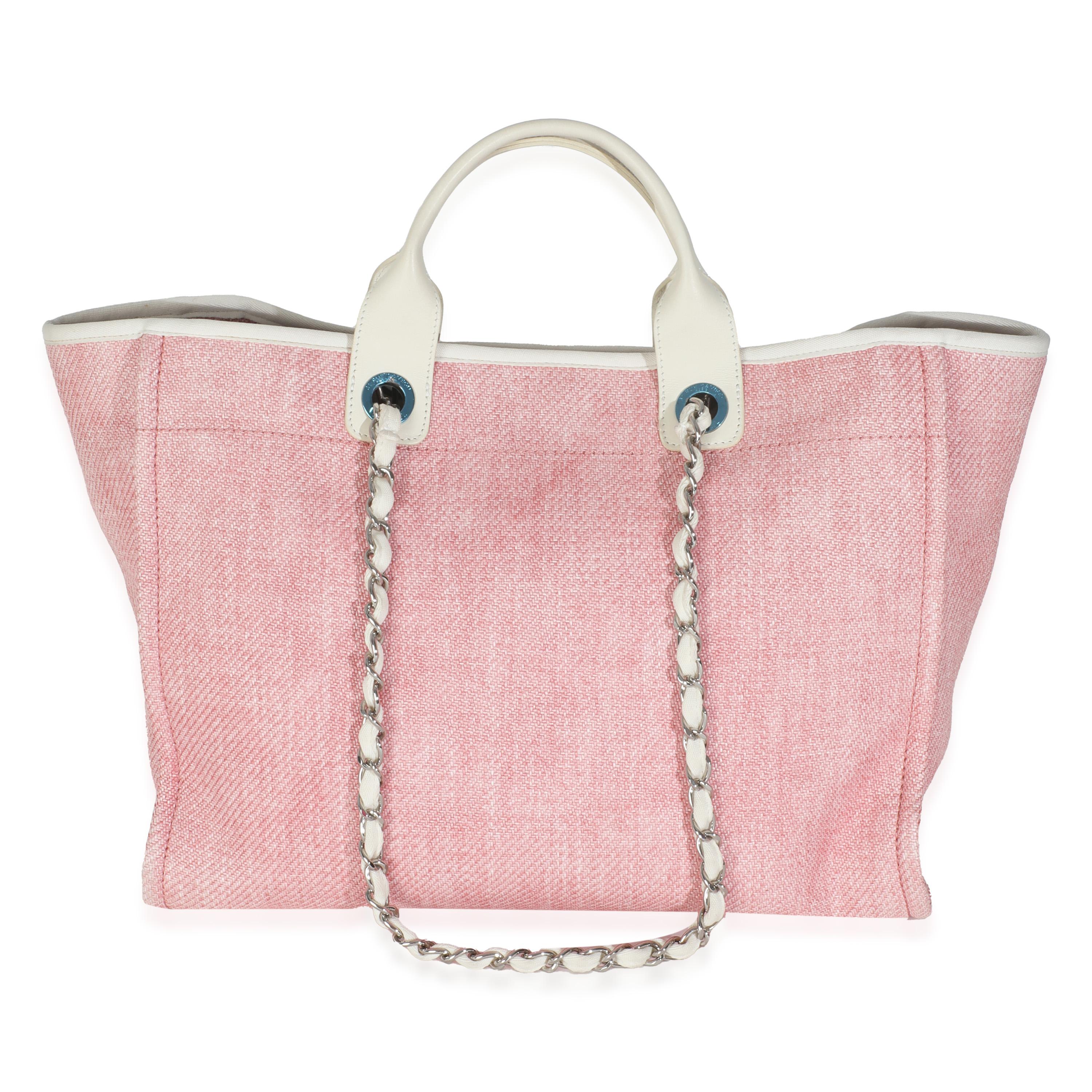 Listing Title: Chanel Pink Mixed Fibers Medium Deauville Tote
SKU: 145991
Condition: Pre-owned 
Condition Description: Intrinsically Chanel, the medium Coco top handle bag was named after the maison's founder. Introduced in 2015, the bag instantly