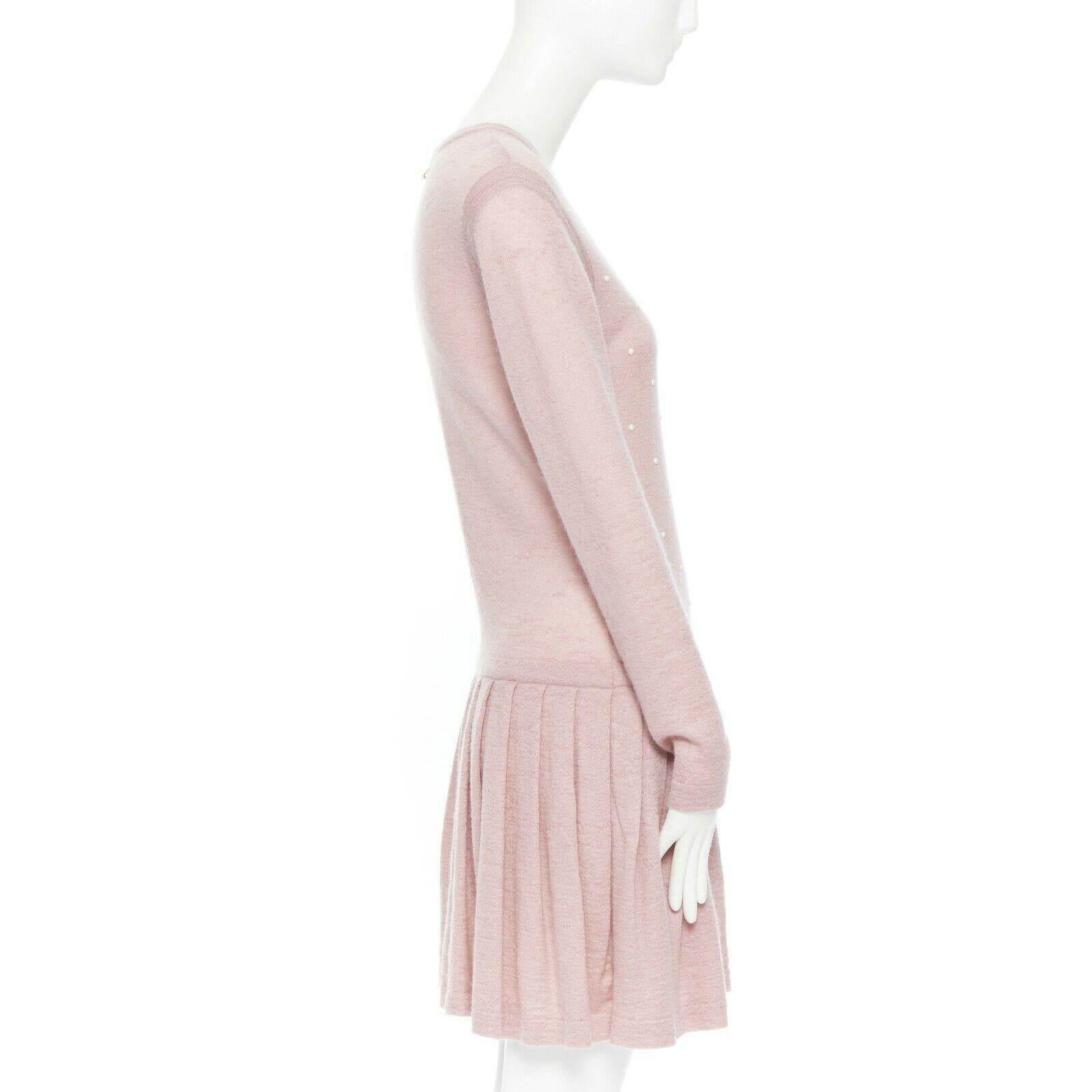 CHANEL pink mohair cashmere pearl embellished skater knitted dress IT40 S

CHANEL BY KARL LAGERFELD
Pure cashmere mohair dress. Ballerina/figure skater style. Exclusive dusty pink color. Pearl and 