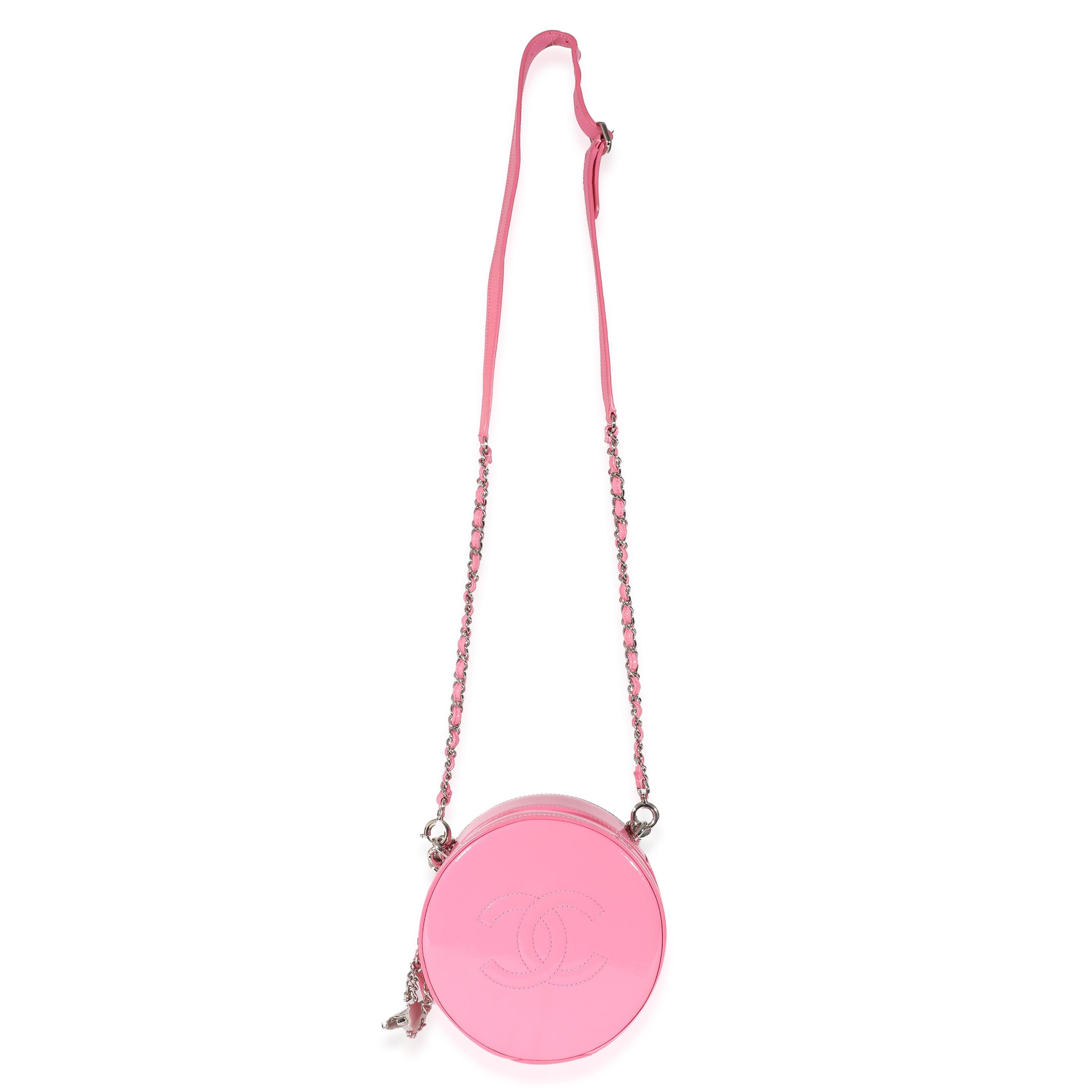 Listing Title: Chanel Pink Patent CC Round As Earth Bag
SKU: 135584
Condition: Pre-owned 
Handbag Condition: Excellent
Condition Comments: Item is in excellent condition and displays light signs of wear. Faint scuffing along interior surface.