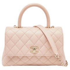 Chanel Rosa gesteppte kleine Coco Top Handle Bag aus Leder in Kaviar