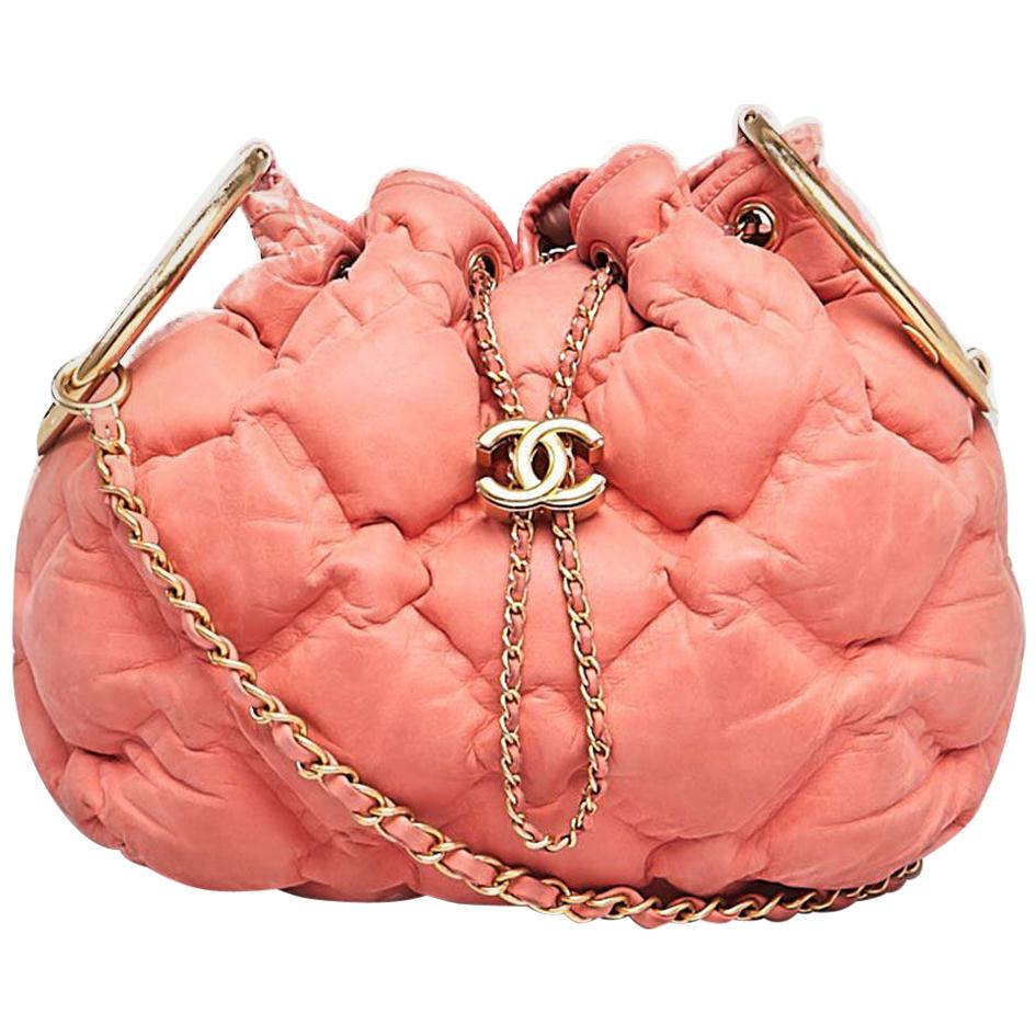 chanel pink quilted handbag