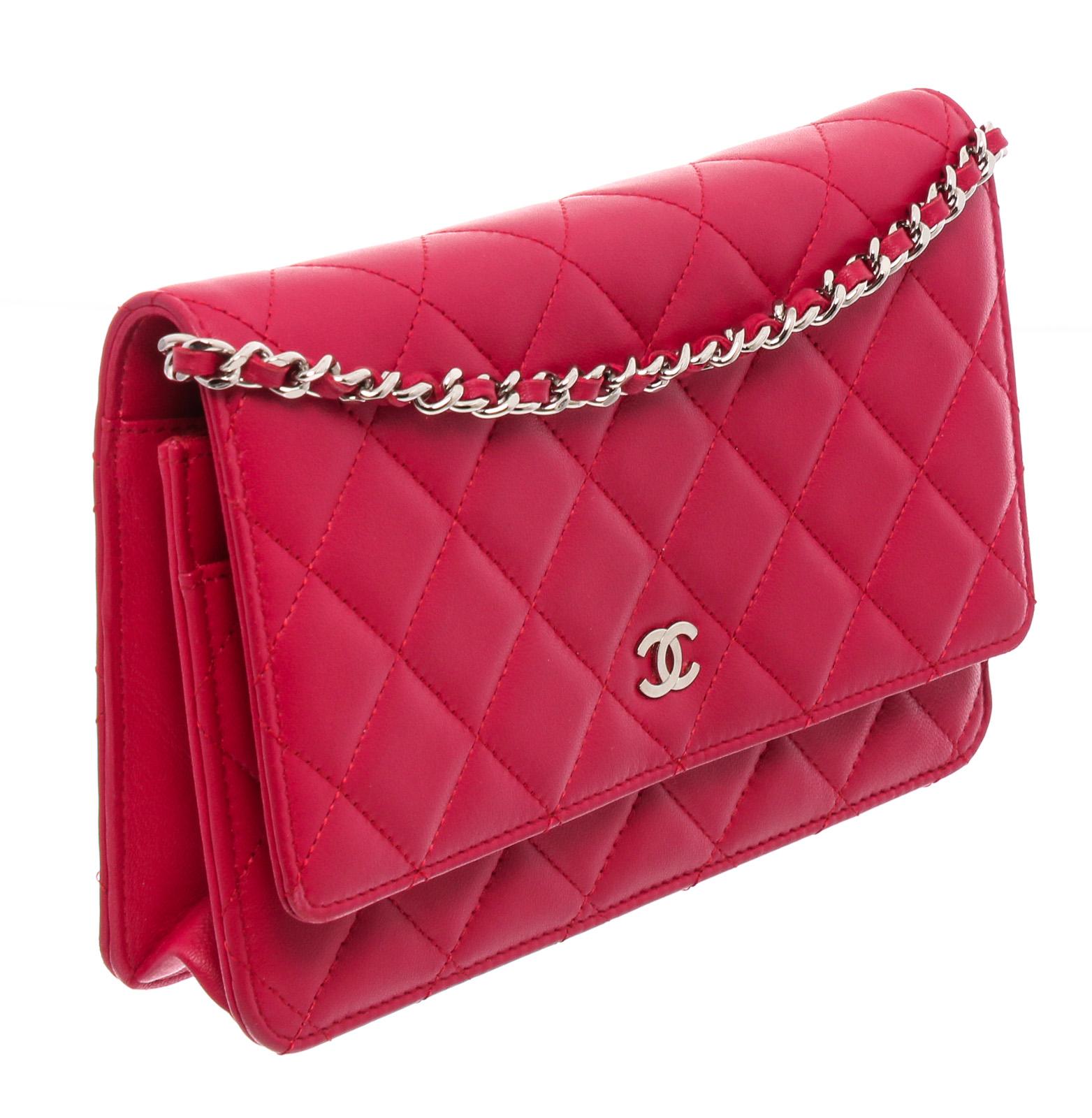 Pink Quilted Lambskin Leather Chanel Wallet On Chain with silver-tone hardware, single leather and chain-link shoulder strap, CC logo adornment at front, single zip pocket flap underside, single slit pocket under front flap, dual compartments; one