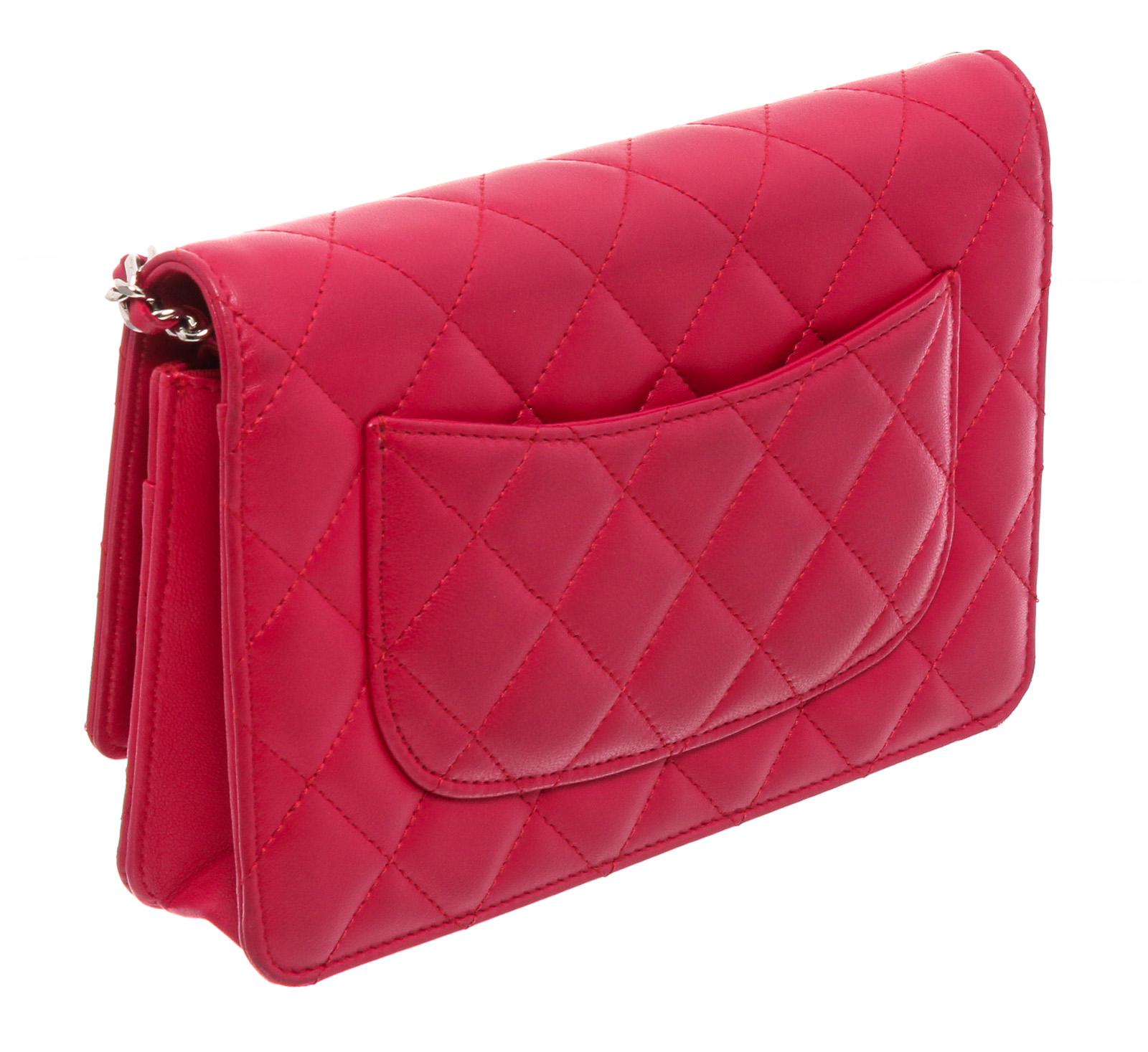 Pink Quilted Lambskin Leather Chanel Wallet On Chain with silver-tone hardware, single leather and chain-link shoulder strap, CC logo adornment at front, single zip pocket flap underside, single slit pocket under front flap, dual compartments; one