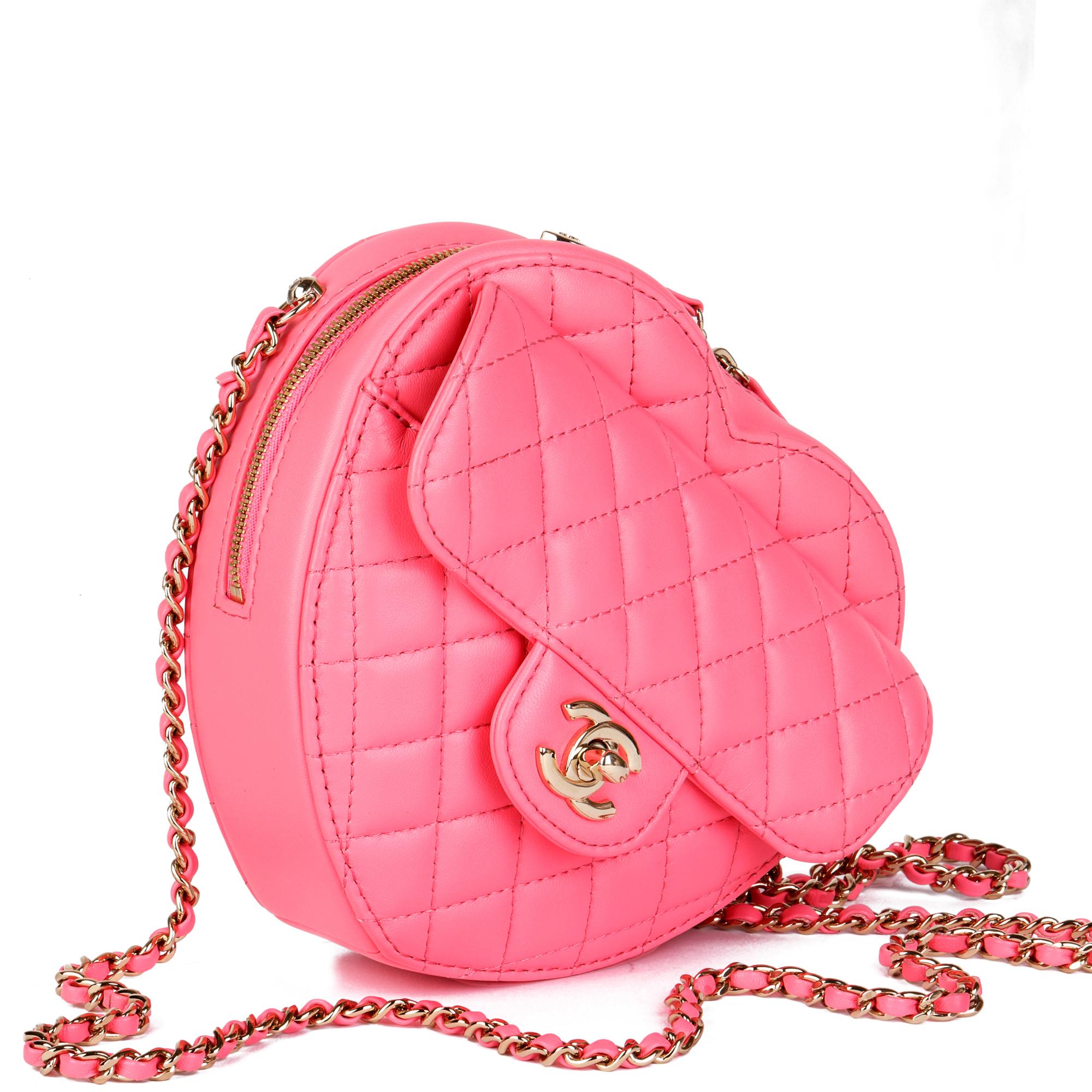 CHANEL
Pink Quilted Lambskin Love Heart Bag

Serial Number: UGU998KC
Age (Circa): 2022
Accompanied By: Chanel Dust Bag, Box, Care Booklet, Protective Felt
Authenticity Details: Microchip (Made in France)
Gender: Ladies
Type: Shoulder,