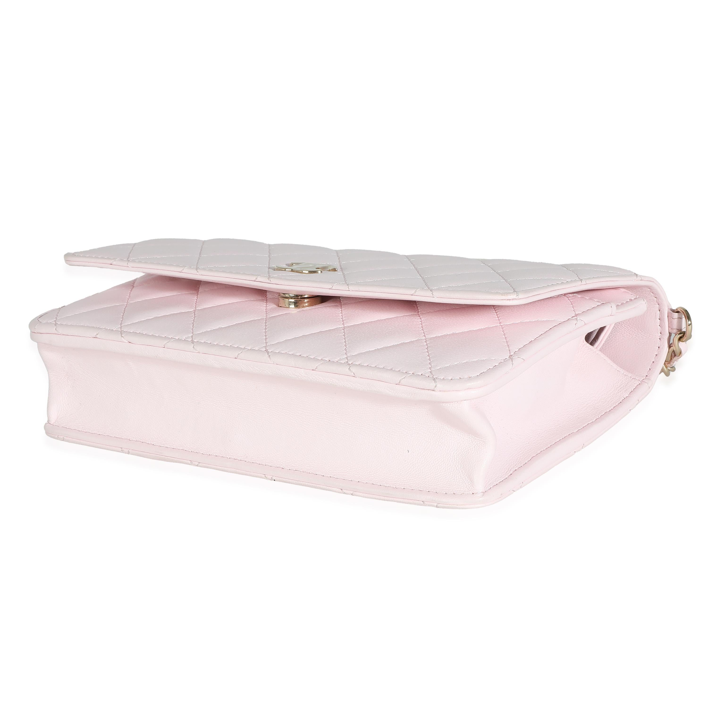 Listing Title: Chanel Pink Quilted Lambskin Pearl Wallet On Chain
SKU: 138121
Condition: Pre-owned 
Handbag Condition: Excellent
Condition Comments: Item is in excellent condition and displays light signs of wear. Plastic along front CC. Mild