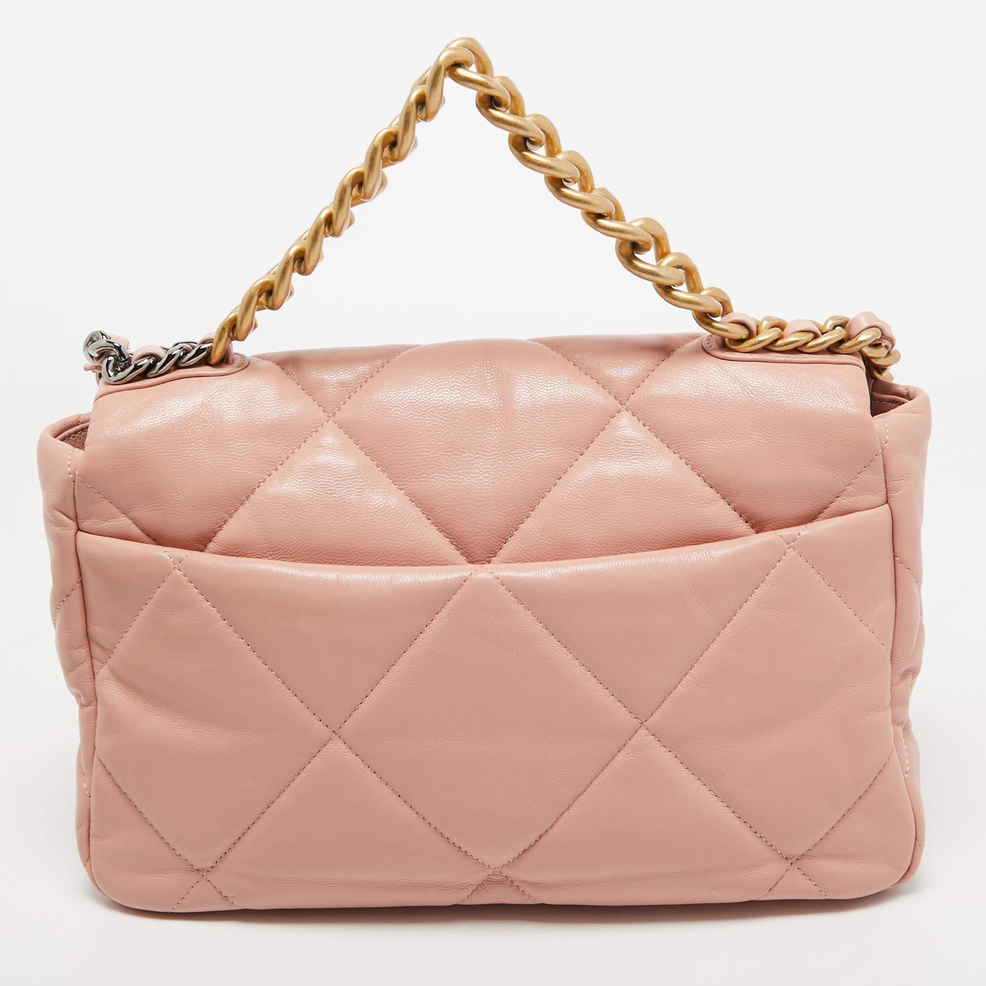 The house of Chanel offers this beautiful 19 flap bag in pink to help you create timeless style edits every season. Crafted with quality materials, this piece will last you a long time.

Includes: Original Dustbag, Authenticity Card, Original Box