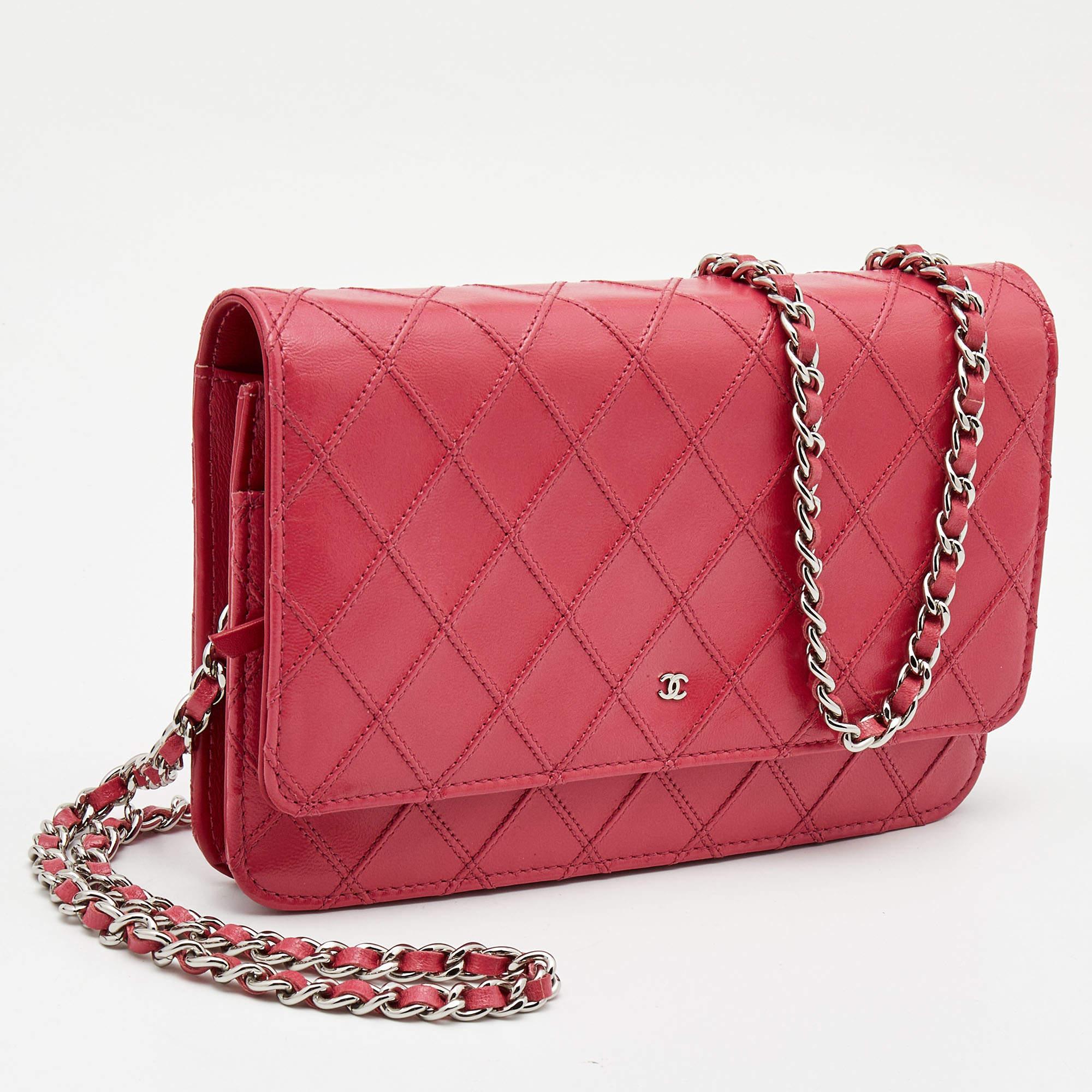 Crafted with precision from patent leather and touched with subtle red shade, this WOC clutch bag from Chanel cannot get any more luxurious than it already is! Bags from the brand are iconic and monumental in the history of fashion, and this