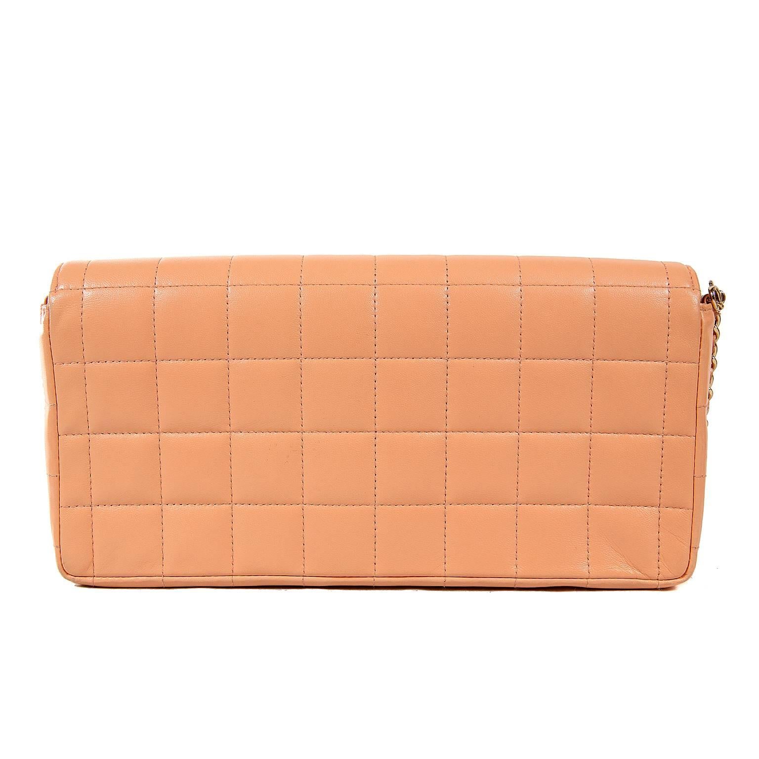 Chanel Pink Leather East West Flap Bag- Excellent Plus Condition
 Simply designed with an optional shoulder strap, the unique color and square quilting makes it a stand out piece.
Pinky salmon leather is quilted in square pattern with gold