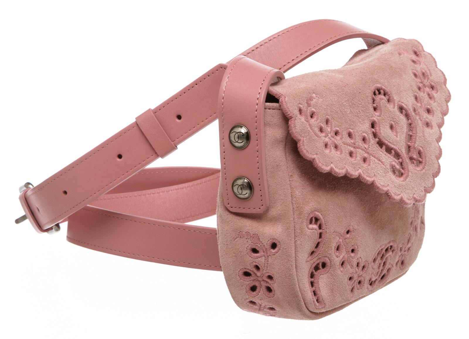Pink suede Chanel Paris-Edinburgh Mini Highlander messenger bag with antiqued silver-tone hardware, single shoulder strap, crochet floral pattern at front face, tonal suede lining and flap closure at front. 

16292MSC MKR