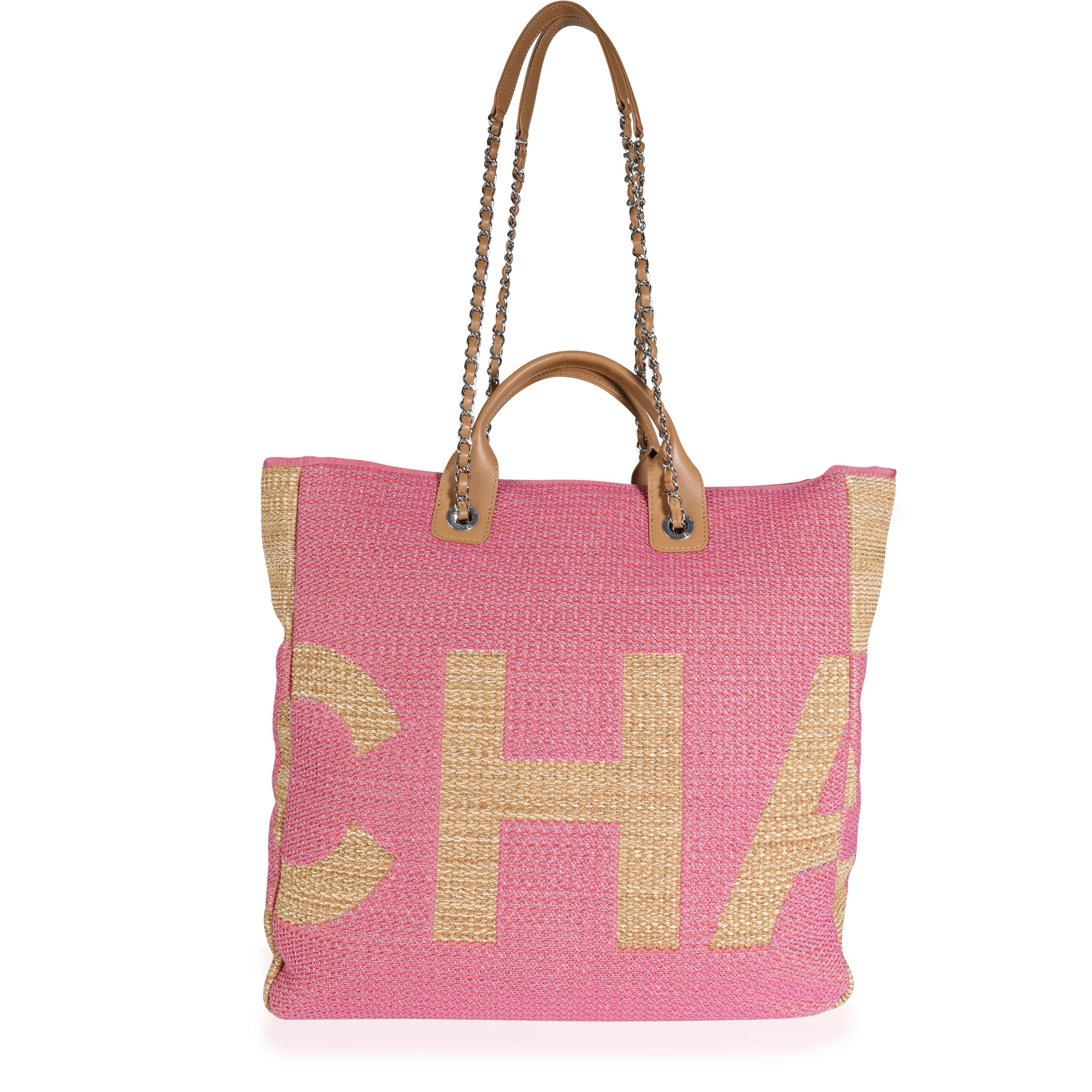Listing Title: Chanel Pink & Tan Raffia Large Shopping Tote
SKU: 114256
MSRP: 4300.00
Condition: Pre-owned (3000)
Condition Description: This Large Shopping Tote by Chanel is constructed with a fun and summery Pink & Tan Raffia, with tan leather