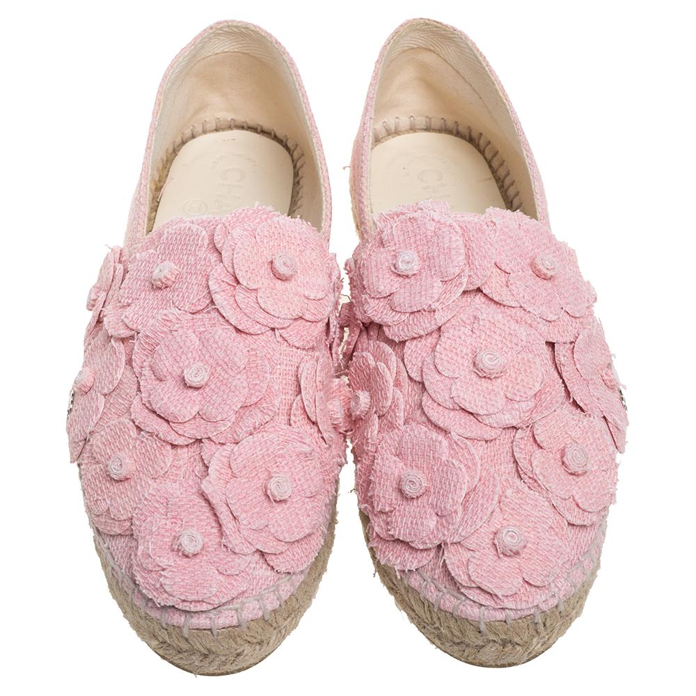 Who knew espadrilles could look so glamorous and stylish! These Chanel espadrilles come crafted from pink tweed fabric and adorned with the signature Camellia flower appliques on the uppers. They flaunt round toes and comfortable leather-lined