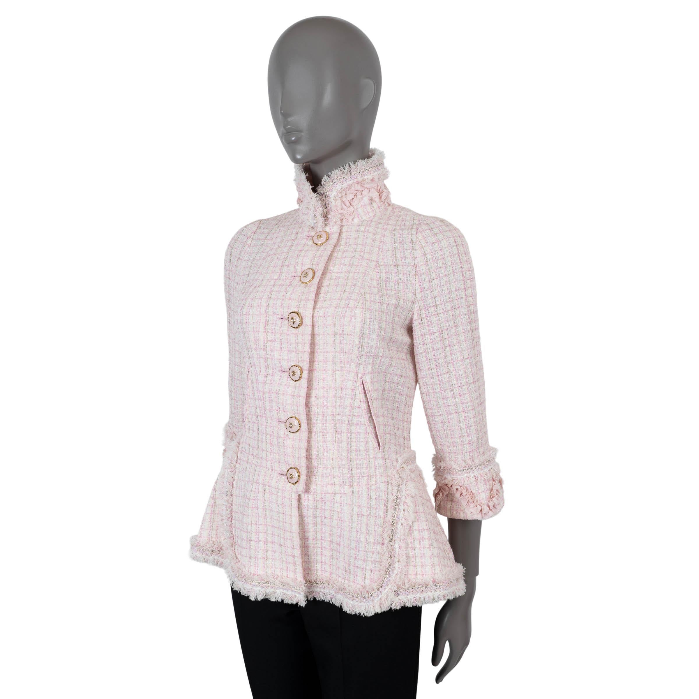 100% authentic Chanel tweed jacket in cream, pink and green nylon (88%) and wool (12%). Features fringe and ruched trims, stand collar, 3/4 sleeves and two pockets at the waist. Closes with crystal embellished buttons on the front and is in silk