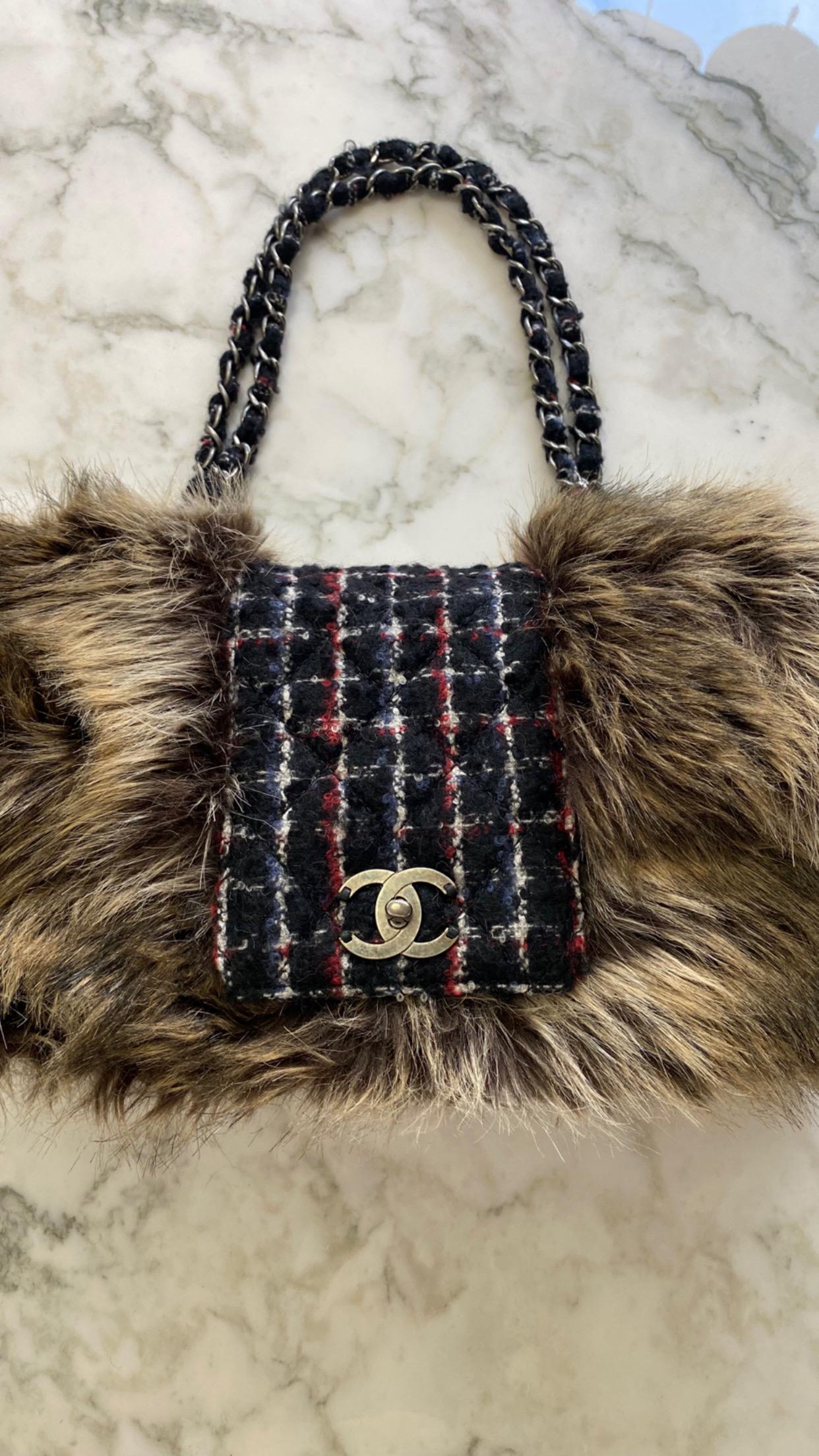 Brand New . Never worn Chanel Plaid Purse with Fur come with Box and ID from 2010.
Measurement: 13” wide / 3” deep