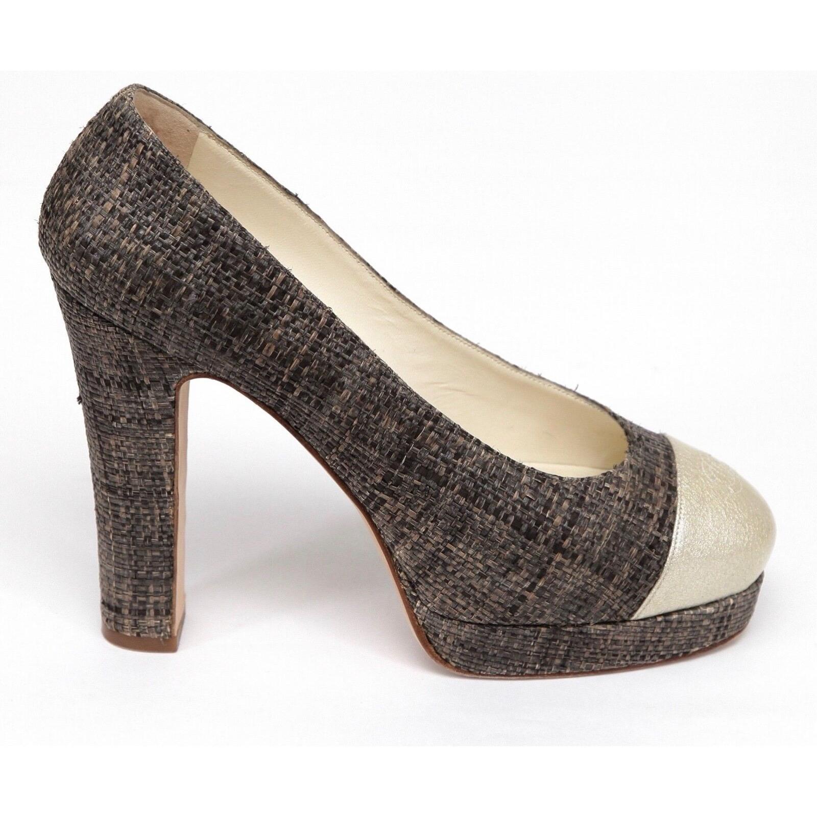GUARANTEED AUTHENTIC CHANEL STRAW PLATFORM PUMP

 

Design:
- Brown straw tweed platform pump.
- Round metallic gold patent leather cap toe with stitched CC logo.
- Self-covered heel.
- Leather lining and sole.
- Comes with dust bag.

Size: