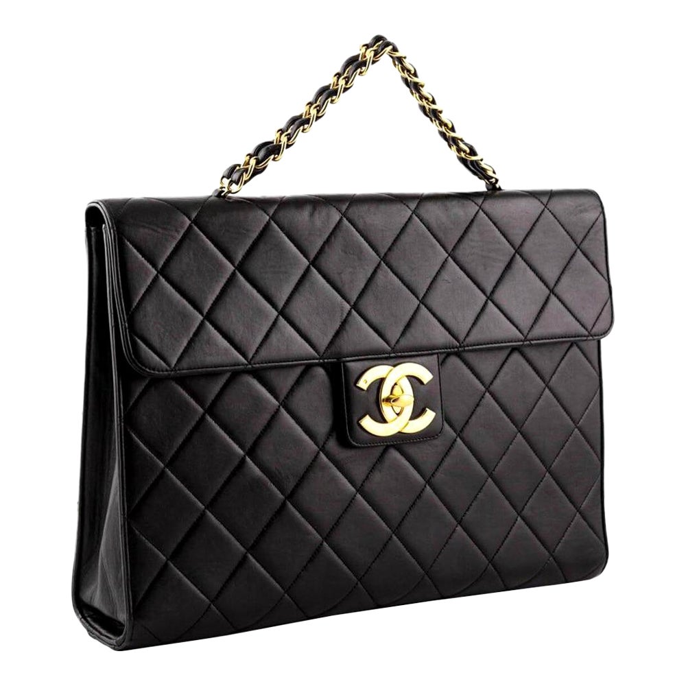 Chanel Rare Vintage Gold Top Handle Business Portfolio Briefcase

Year: 1994 {VINTAGE 28 Years}
Gold hardware
Quilted lambskin leather
Two Sided CC Turnlock
Classic interwoven chain top handle
Main compartment has burgundy leather lined