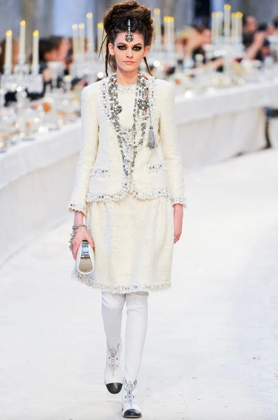 Introducing a breathtaking embellished skirt suit from the Chanel Metiers D'Art Pre-Fall 2012 Paris-Bombay collection. The Metiers D'Art collections are the epitome of craftsmanship in the world of ready-to-wear fashion, right before stepping into