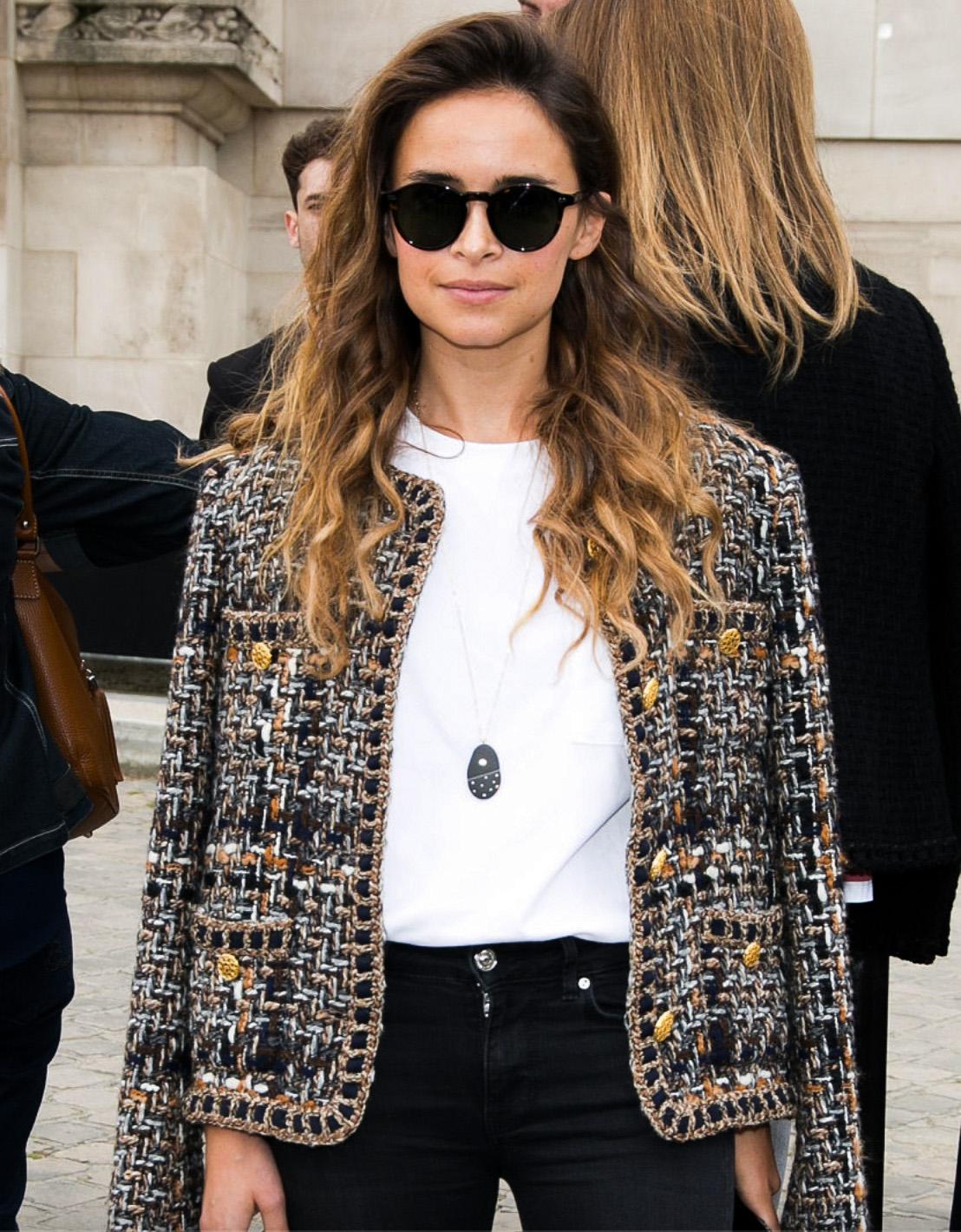 This is the highly sought-after multicolor brown jacket from Chanel’s Métiers d’Art 2016 “Paris in Rome” collection. The Métiers d’Art line is known for showcasing the best craftsmanship in Chanel’s ready-to-wear, just one step below Haute Couture.