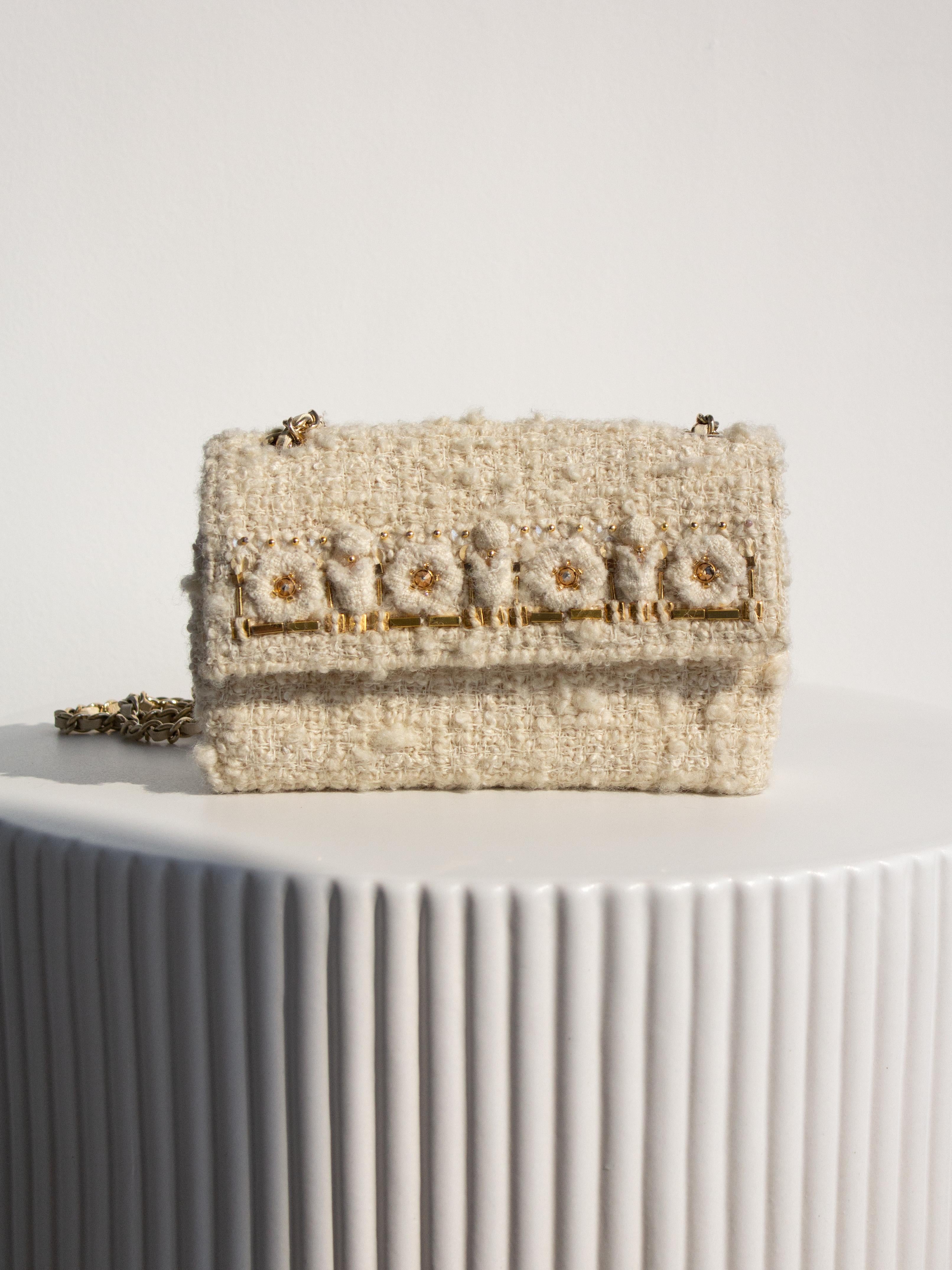 This exquisite wallet on chain is a rare gem from the Chanel Pre-Fall 2017 Paris-Cosmopolite collection, unveiled at the legendary Ritz Hotel. The Metiers D'Art collections are the epitome of craftsmanship in the world of ready-to-wear fashion,