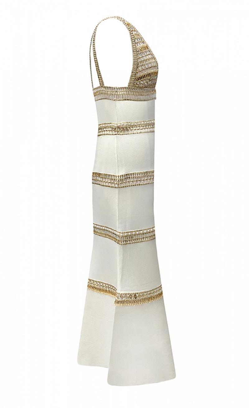 white dress with gold trim