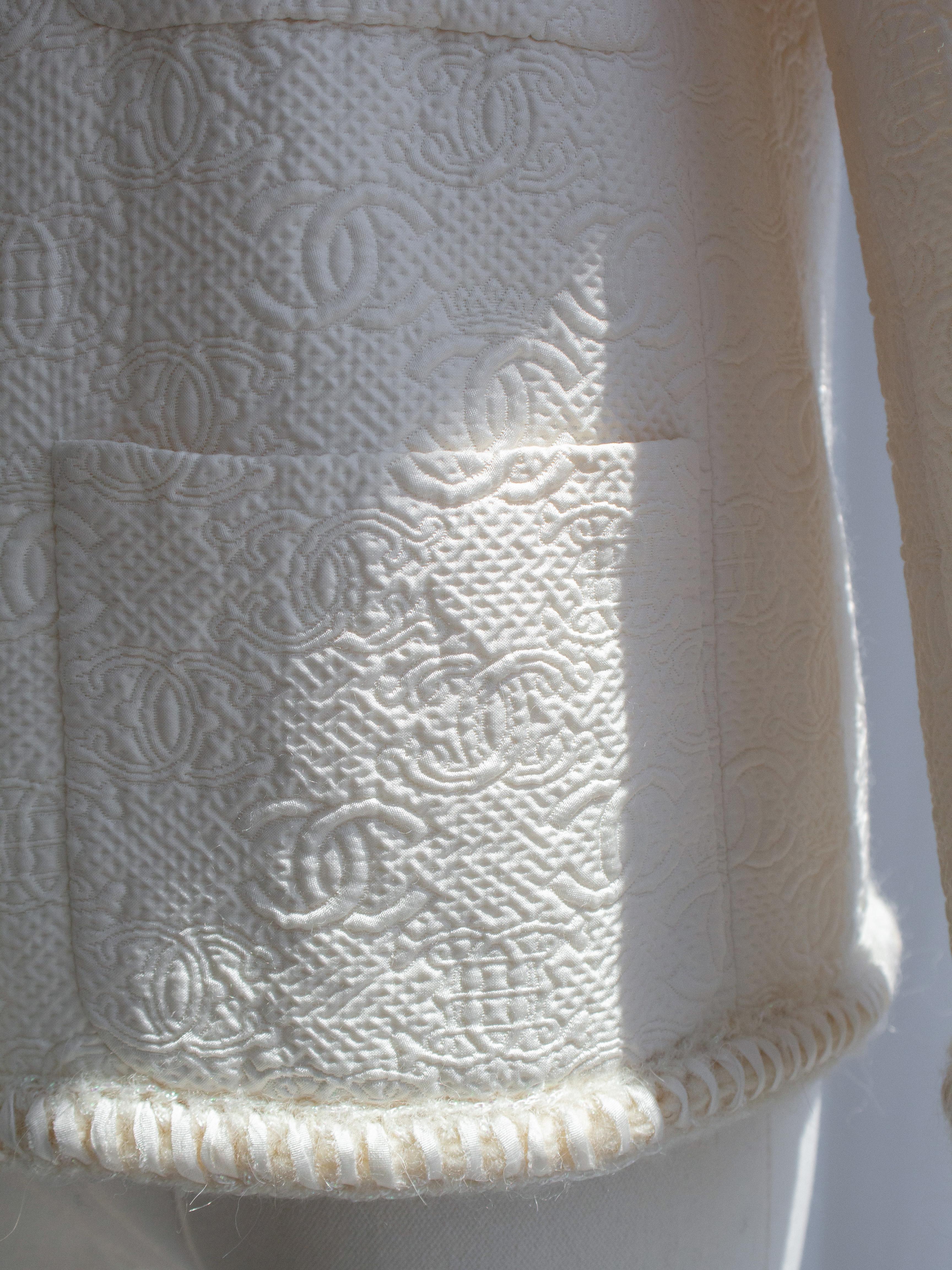 Chanel Pre-Fall 2021 Metiers D'Art White Embossed CC Logo 21A Jacket 6