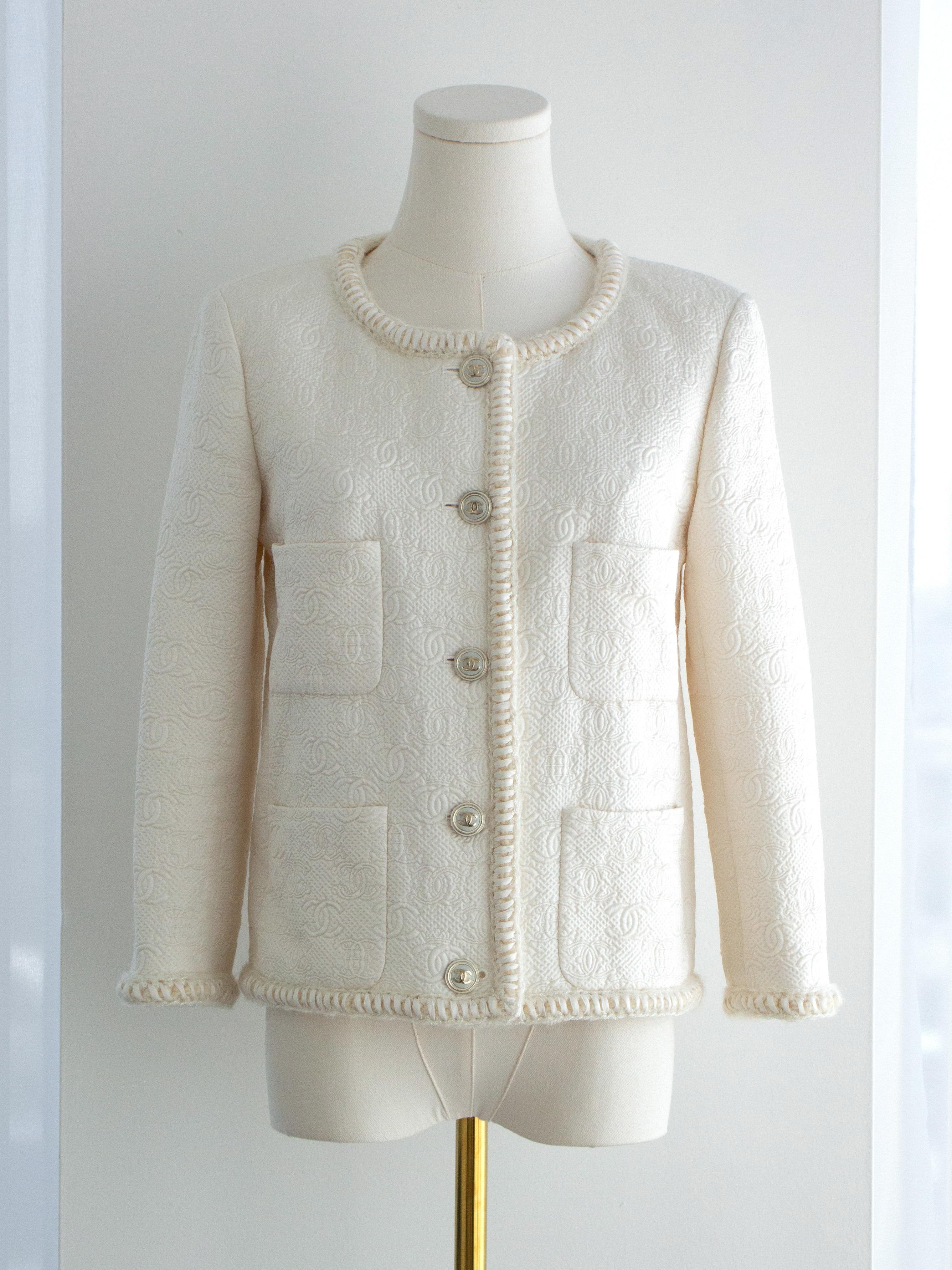 Chanel Pre-Fall 2021 Metiers D'Art White Embossed CC Logo 21A Jacket 1
