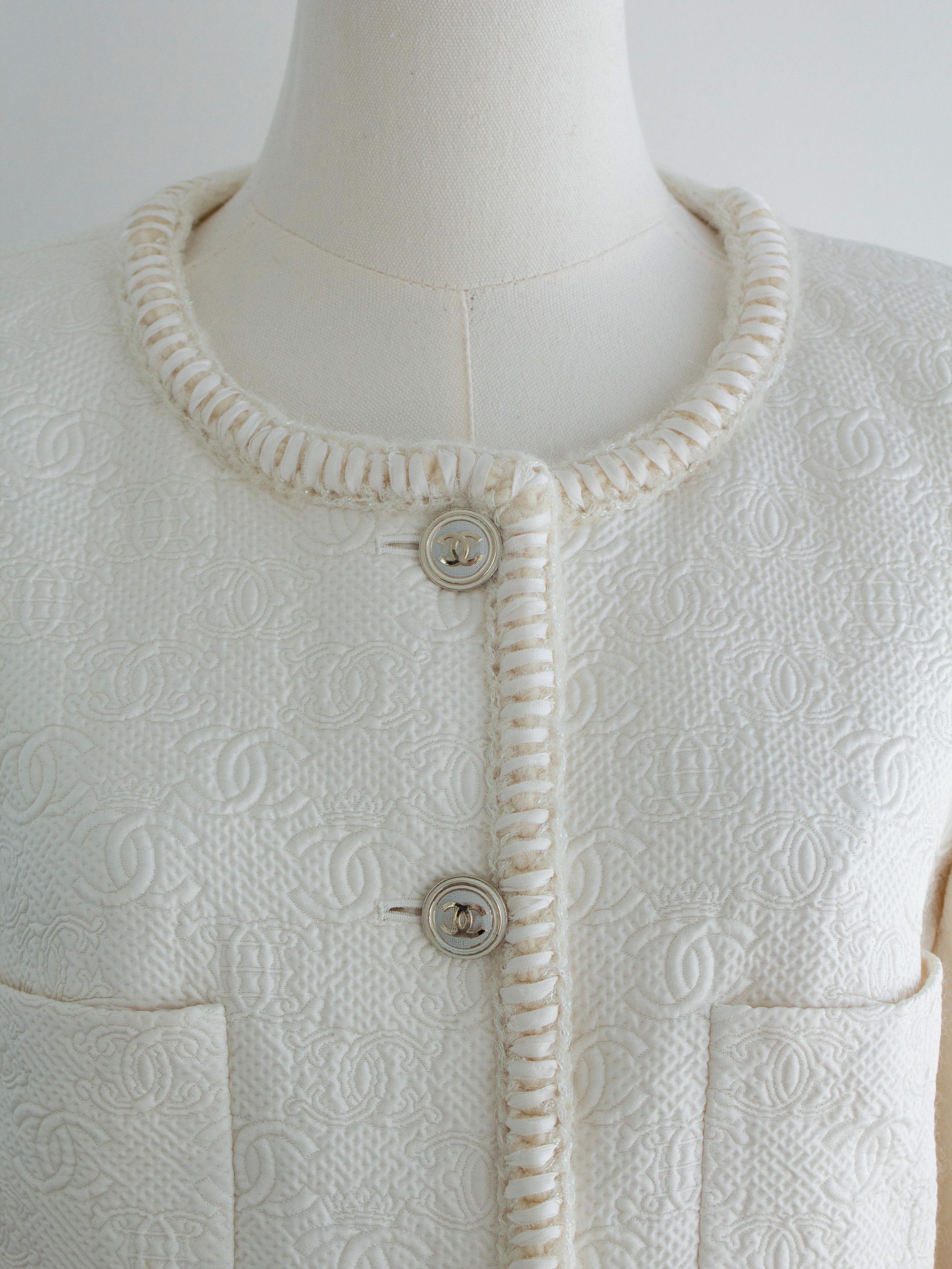 Chanel Pre-Fall 2021 Metiers D'Art White Embossed CC Logo 21A Jacket 2