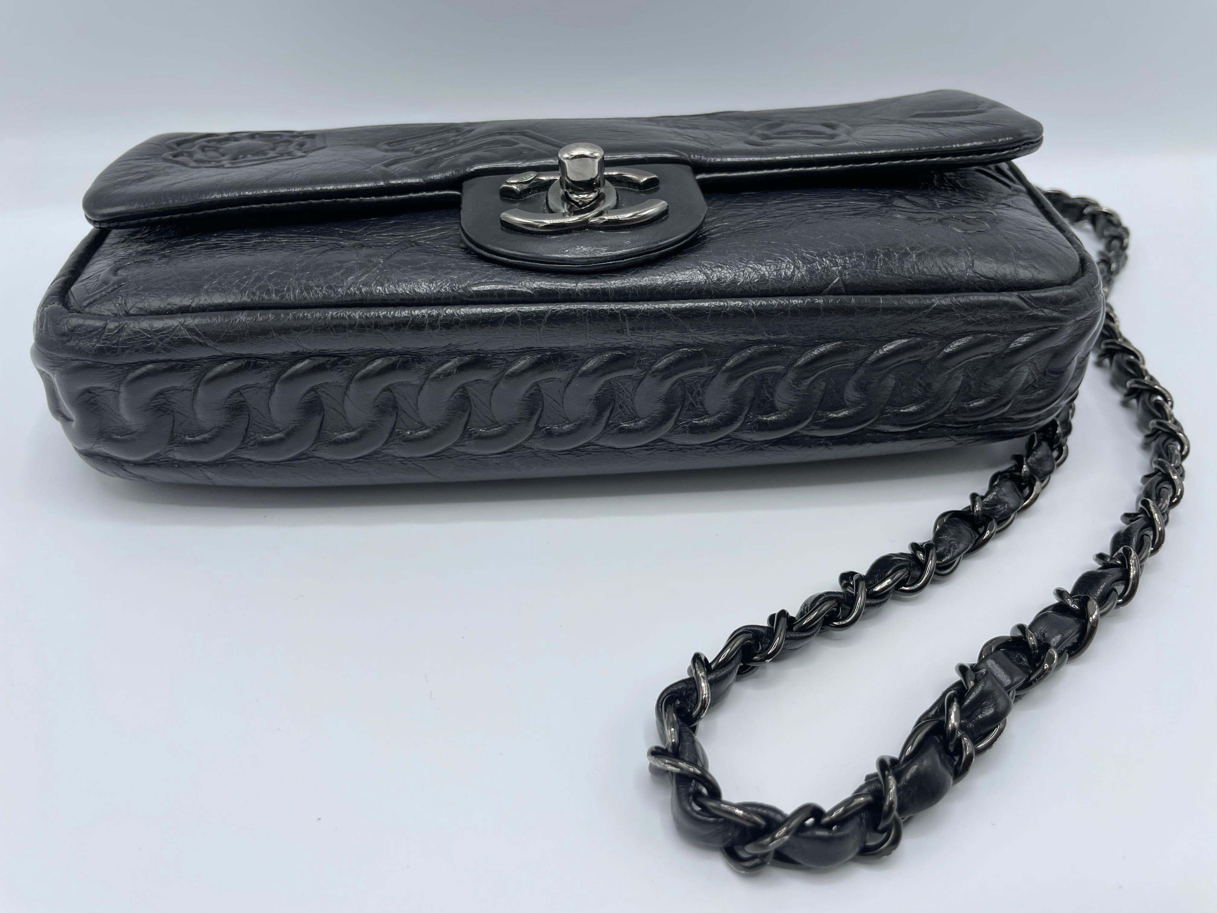 Women's or Men's Chanel Precious Symbols Flap Embossed Leather