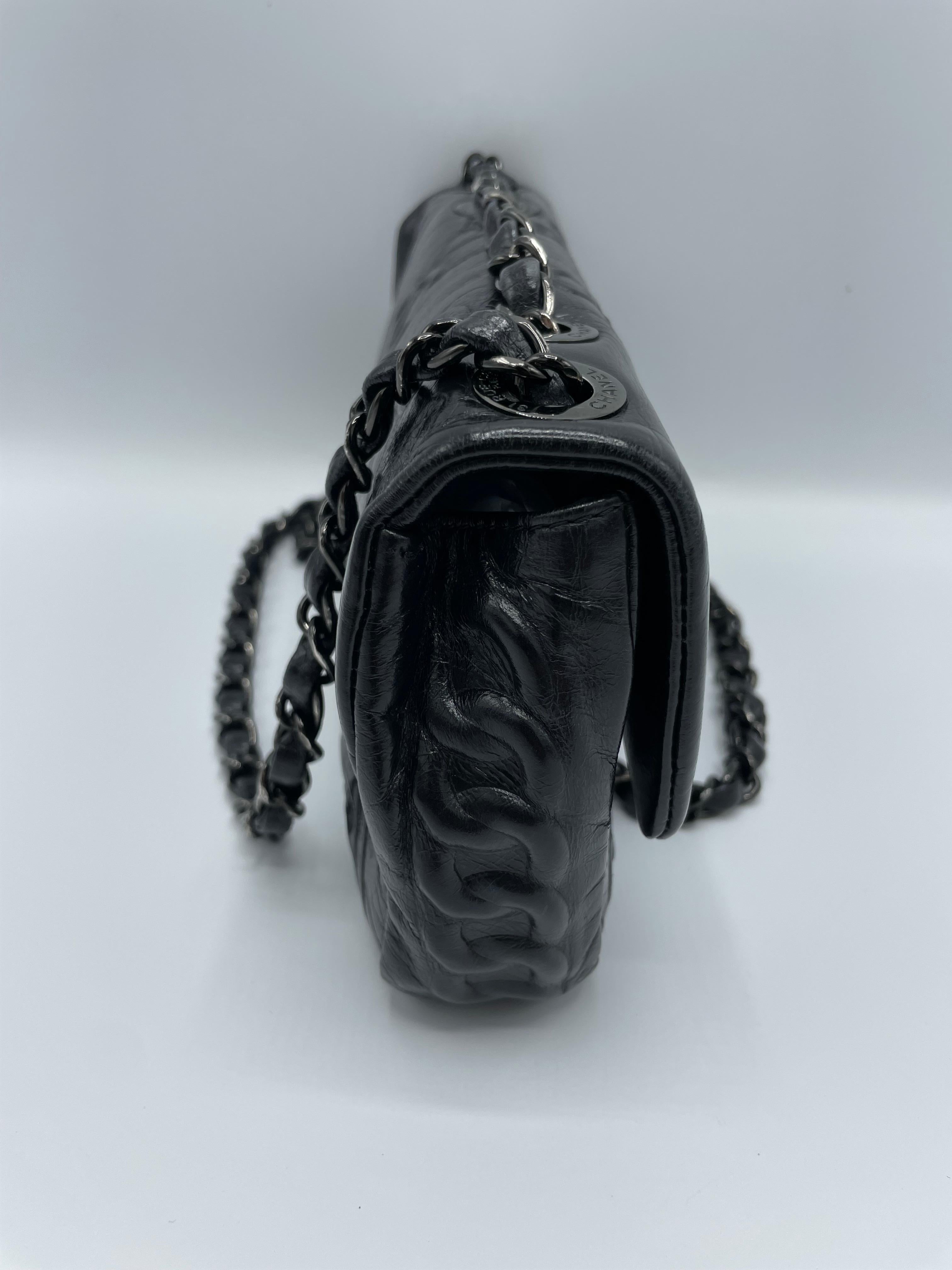 Chanel Precious Symbols Flap Embossed Leather 1