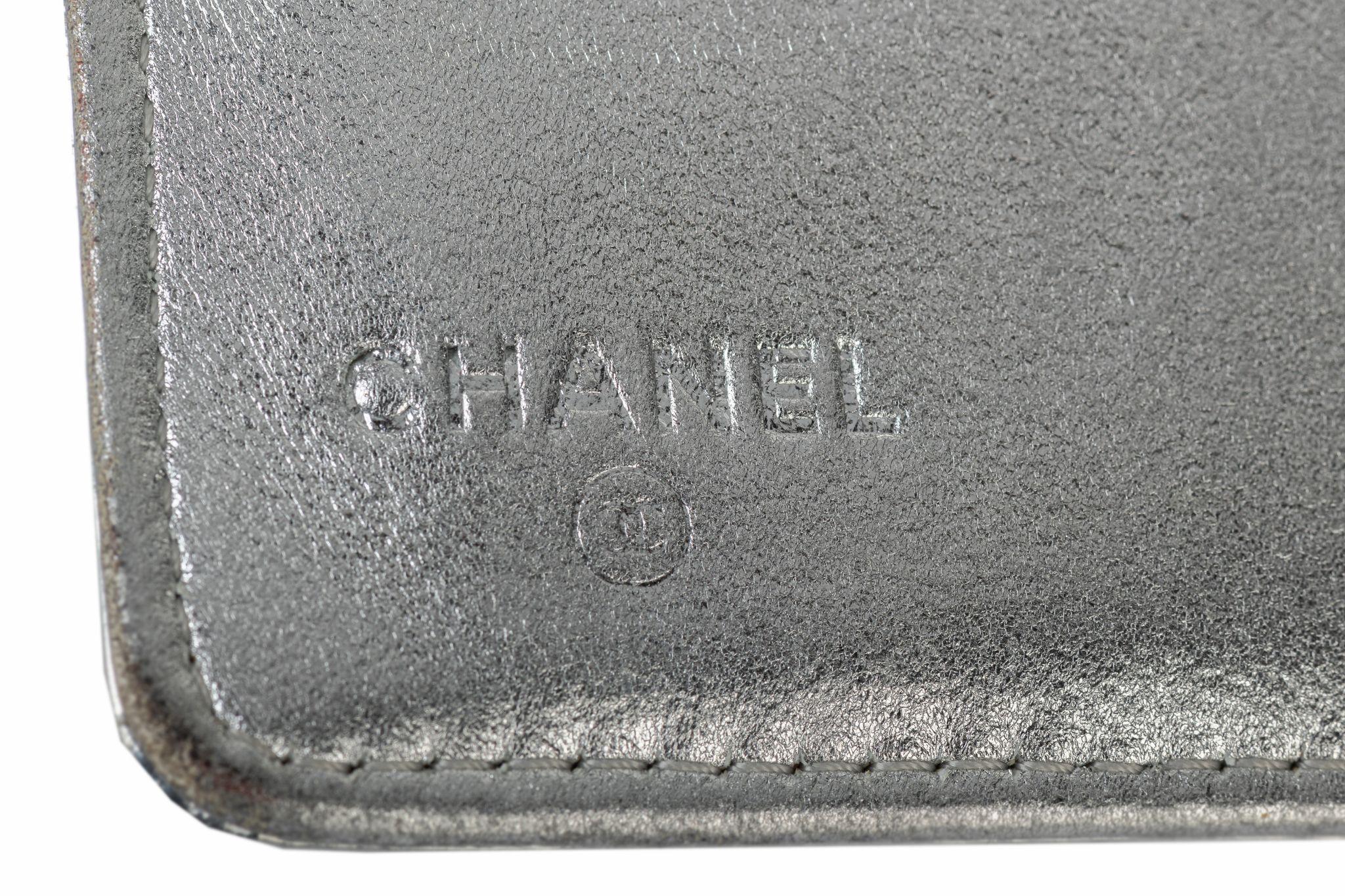 Chanel Preloved Silver Symbols Wallet In Good Condition For Sale In West Hollywood, CA