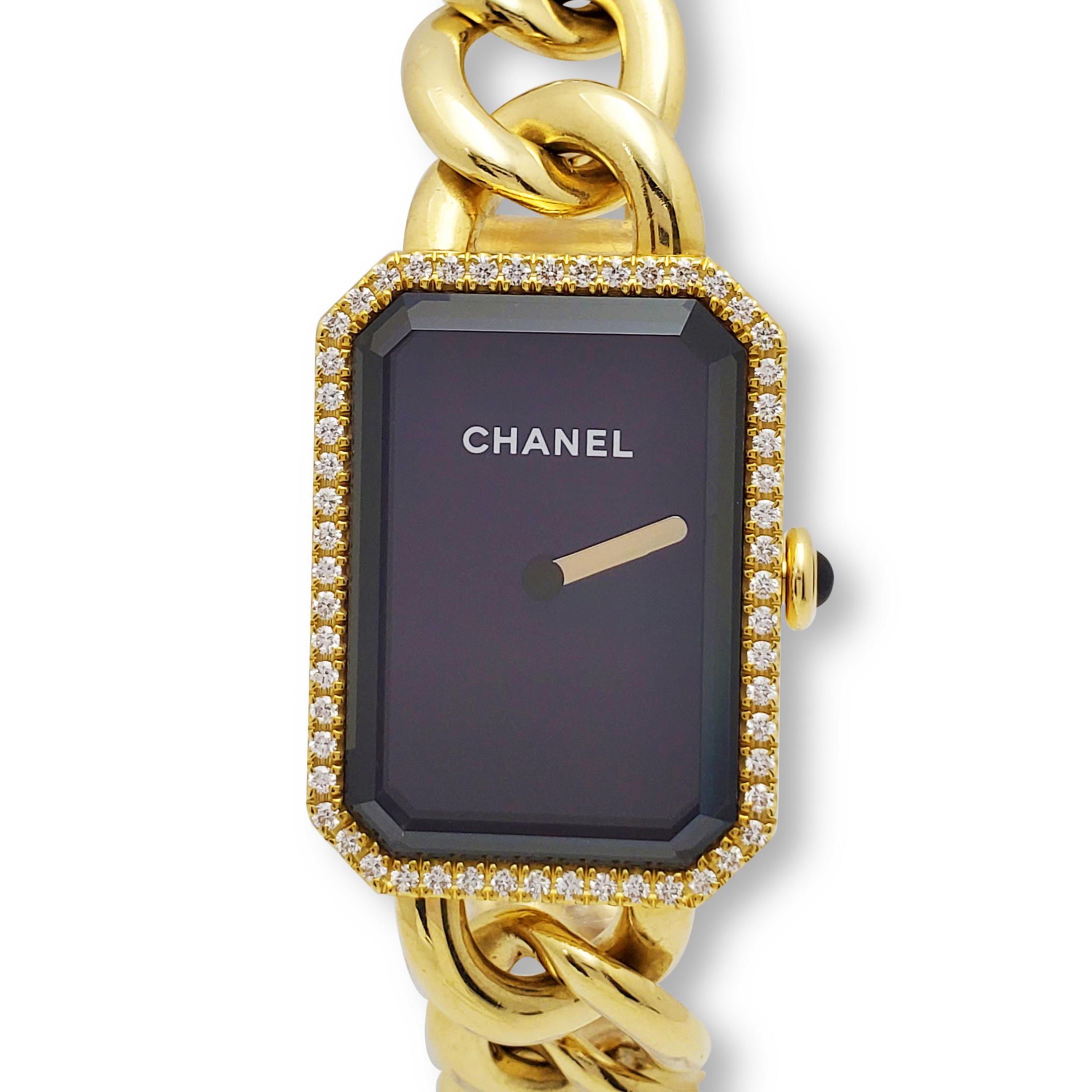 Authentic Chanel Première watch crafted in 18 karat yellow gold. 20mm x 28mm case, 18 karat yellow gold chain bracelet, black lacquered dial, diamond set bezel and onyx cabochon crown.  Swiss Quartz movement.  Will fit up to a 7 inch wrist.  Watch