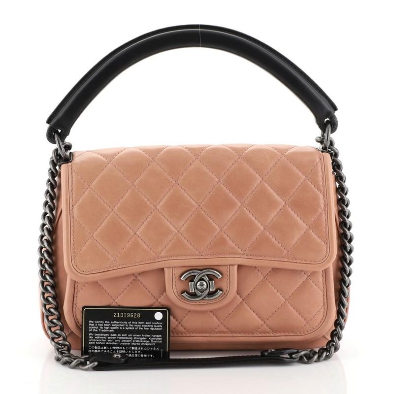 This Chanel Prestige Flap Bag Quilted Calfskin Medium, crafted in pink quilted calfskin leather, features a sturdy leather top handle, chain-link shoulder strap with shoulder pad, CC press lock closure and aged silver-tone hardware. Its press-lock
