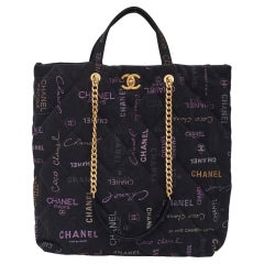 Used Chanel Printed Logo Black Denim Graffiti Shopping Maxi Tote Bag (2021)