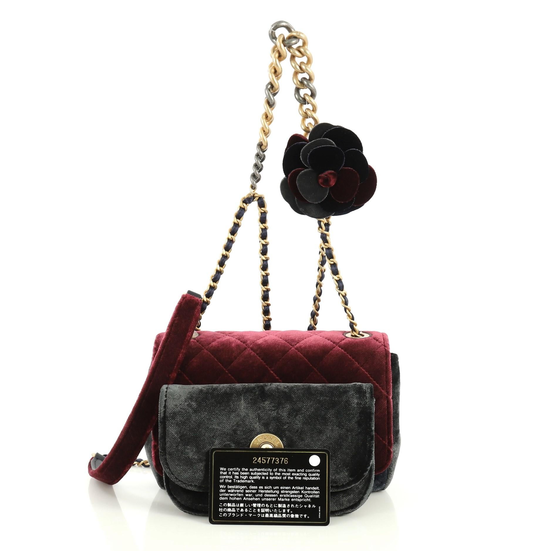 This Chanel Private Affair Camellia Flap Bag Quilted Velvet Small, crafted from multicolor quilted velvet, features a chain-link handle, woven-in satin chain link strap and matte gold-tone hardware. Its CC turn-lock closure opens to a red satin