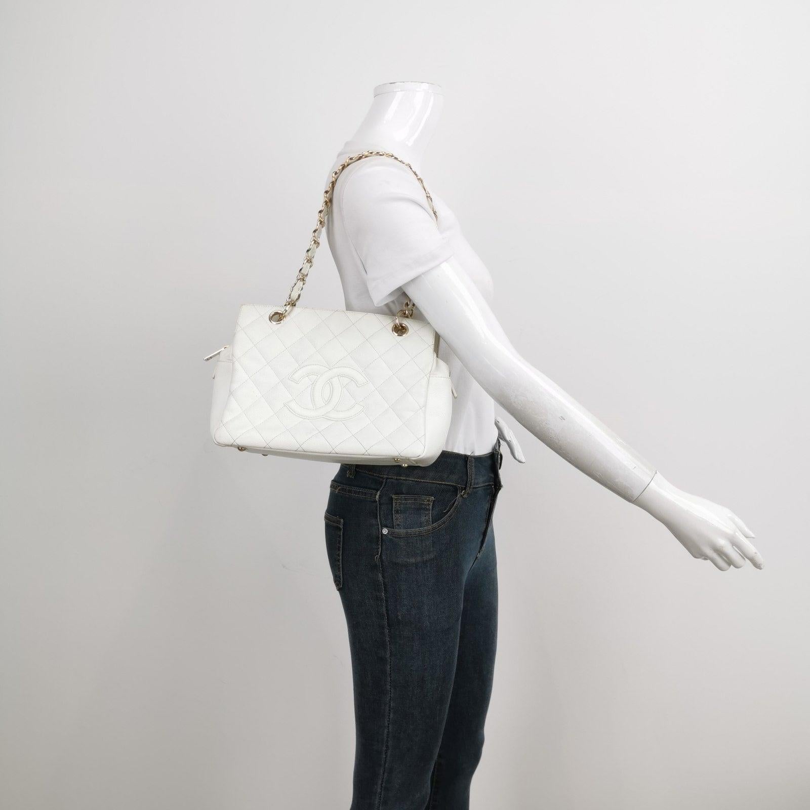 Chanel PST Petite Shopping Tote 2002 White Caviar Leather Chain Bag These are professional photos of the actual bag offered by Luxbags. Discontinued in 2015, the Grand Shopping tote bag is one CHANEL rarity that is highly treasured. This version