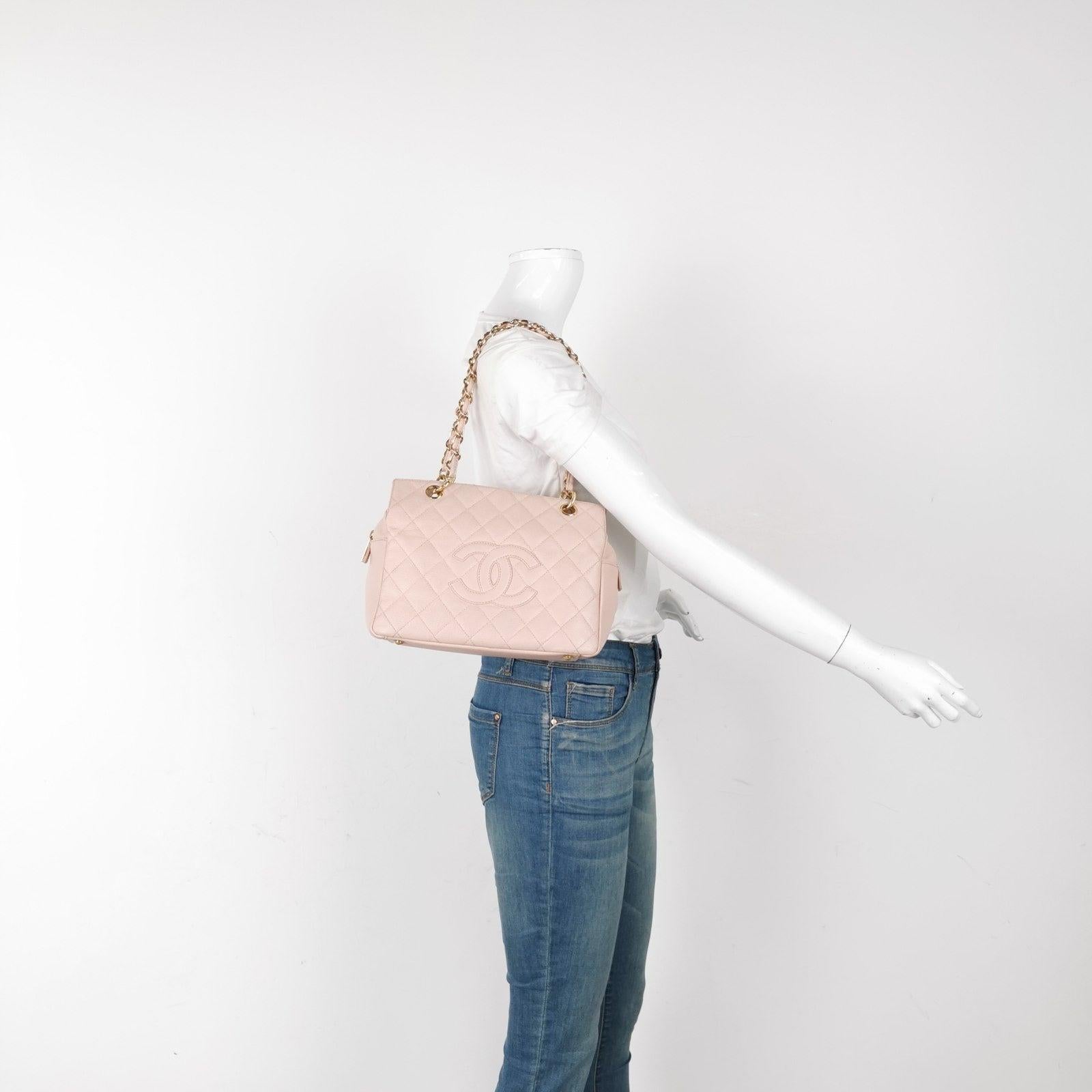 Chanel PST Petite Shopping Tote Pale Pink Caviar Leather Chain Bag These are professional photos of the actual bag offered by Luxbags. Discontinued in 2015, the Grand Shopping tote bag is one CHANEL rarity that is highly treasured. This version