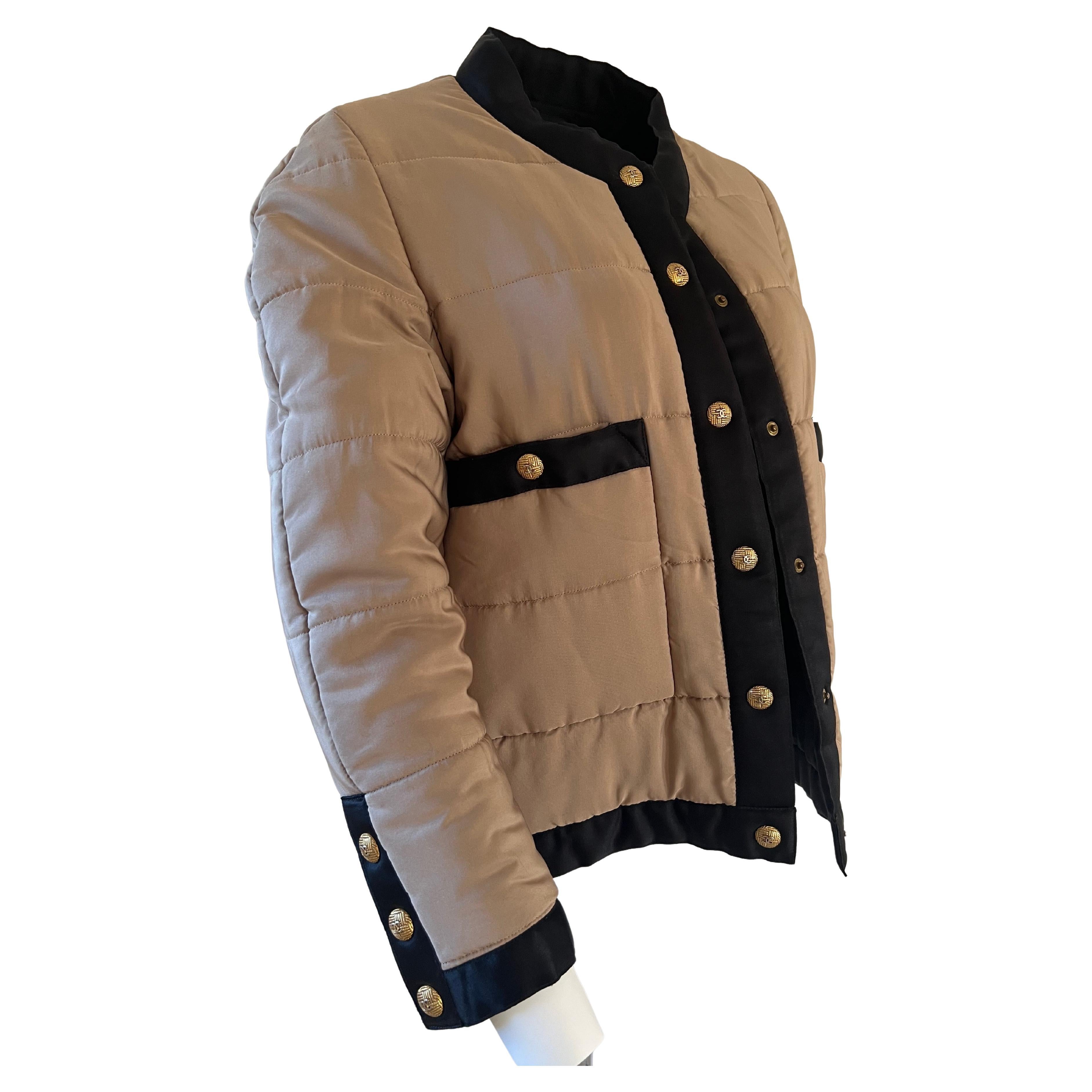 Vintage Chanel boutique 1990s campaign quilted Puffer silk jacket

Composed of luxurious 100% silk fabric
This amazing silk quilted jacket features long sleeves, rounded neckline, black trims, six gold plated metal 'CC' press stud buttons front down