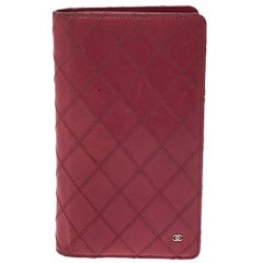 Chanel Punch Pink Quilted Leather Vertical Flap Wallet