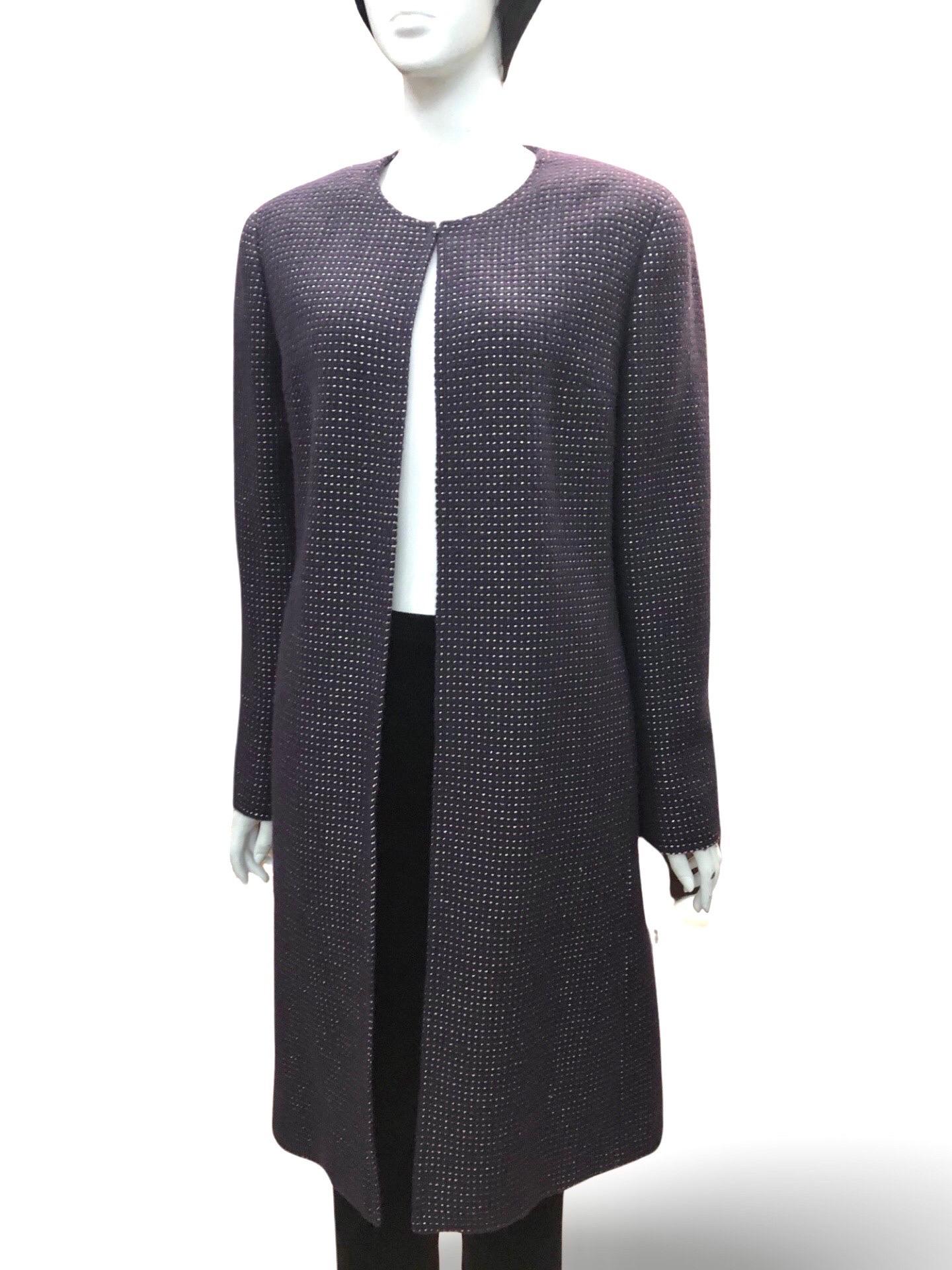 - Chanel purple and gold tweed collarless wool coat from autumn/winter 2000 collection. 

- Hook closure. 

- CC Hardware cuff. 

- Size 42. 