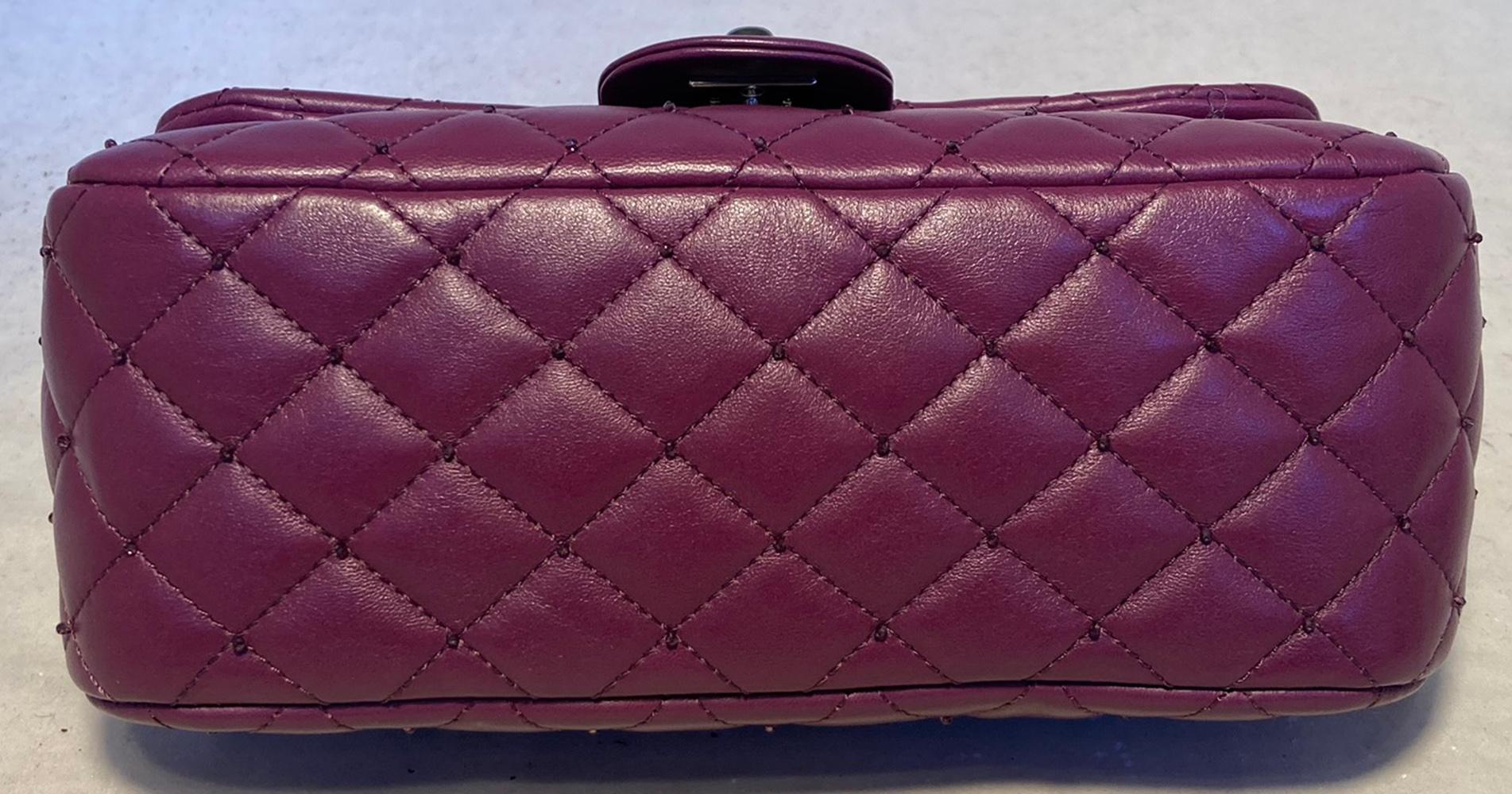 Chanel Purple Beaded Leather Classic Flap Shoulder Bag in excellent condition. Purple quilted lambskin leather exterior trimmed with silver hardware and delicate purple beads at every stitched X. Signature CC logo twist closure opens via single flap