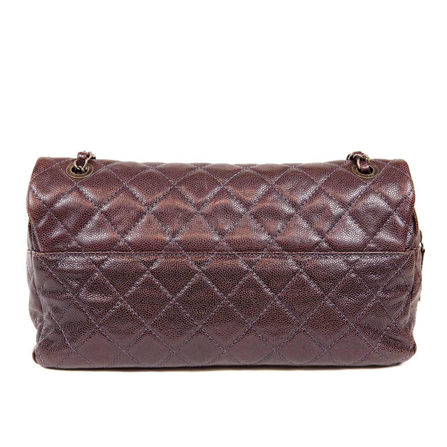 Chanel Purple Caviar Easy Zip Flap Bag- PRISTINE; Never Carried
Very similar to a Classic Flap, the Easy Zip has a secure zippered top beneath the flap.  Beautiful in a surprisingly neutral dark purple, it is perfect for daily enjoyment. 
Durable