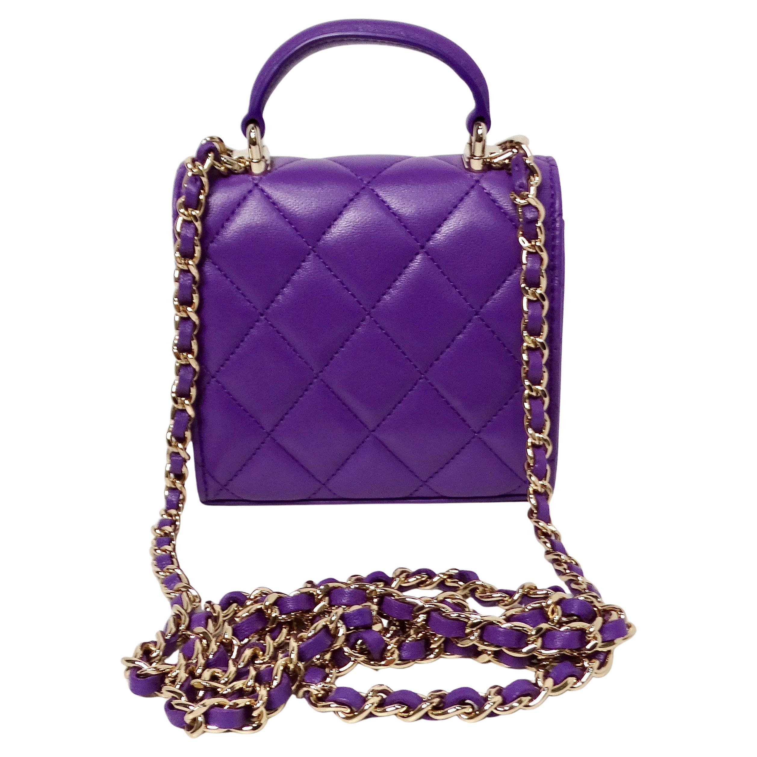 The Chanel Purple Lambskin Quilted Leather Mini Kelly Bag With Mirror is a luxurious and versatile accessory that embodies Chanel’s timeless elegance and craftsmanship. Crafted from soft, high-quality lambskin leather in a rich purple hue, this mini