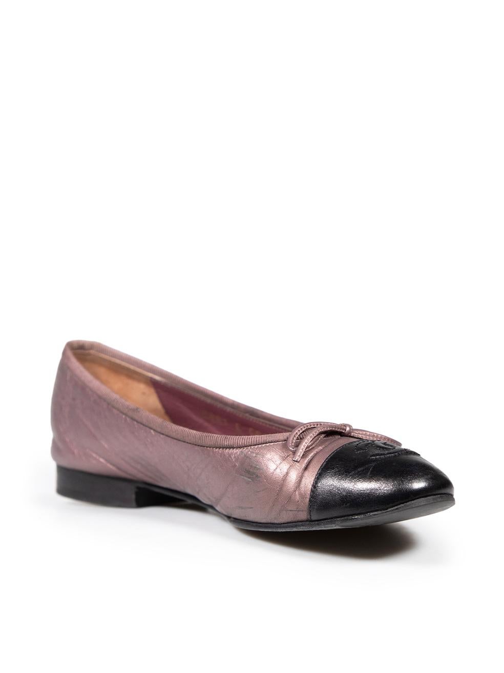 CONDITION is Good. General wear to shoes is evident. Moderate signs of wear with abrasion and discolouration on both toe tips, sides, back, and fabric trim at the top on this used Chanel designer resale item. The items comes with original dust