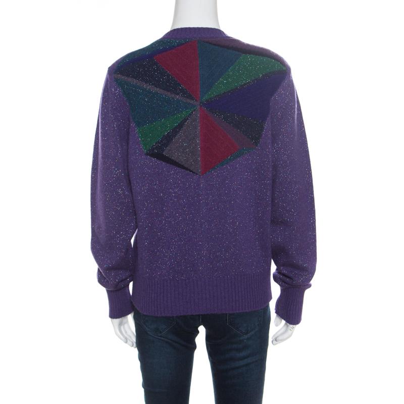 Who doesn't love creations that are both comfortable and stylish at the same time? This Purple cardigan is made of a cashmere blend and features a lurex knit design. It flaunts a round neckline, embellished front button fastenings and long sleeves.