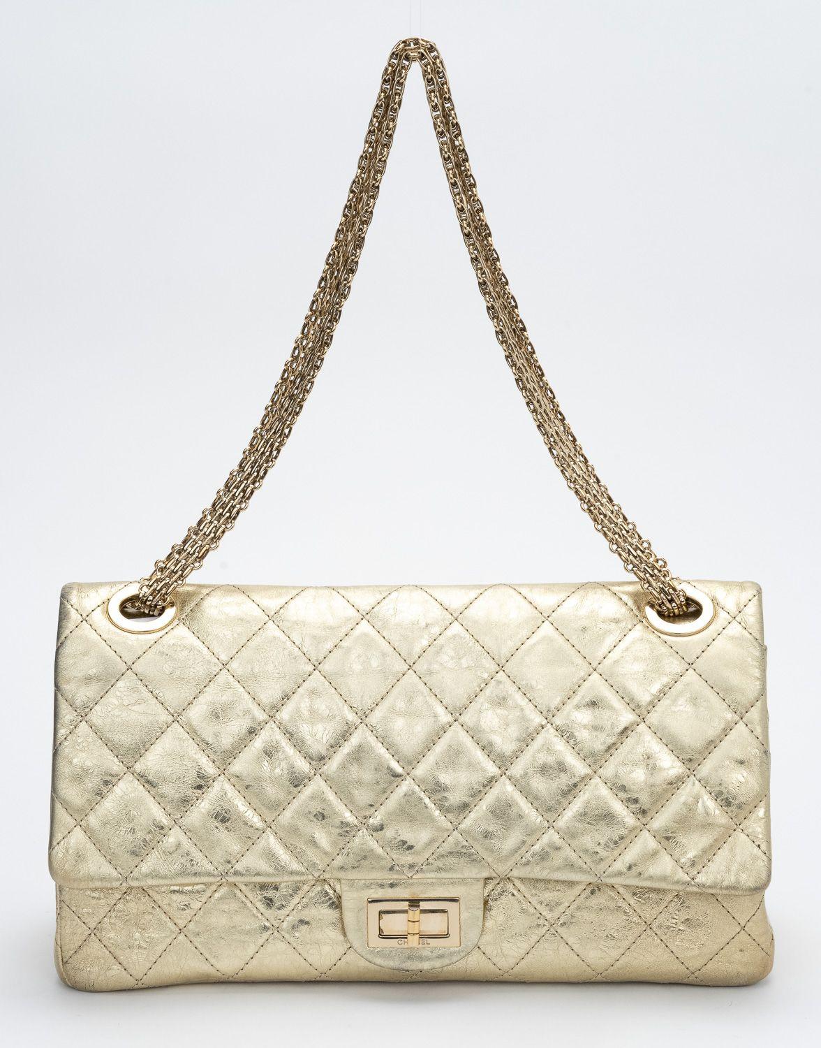 Chanel limited edition maxi reissue double flap with extra thick silver chain. Gold metallic distressed leather. Shoulder drop 10