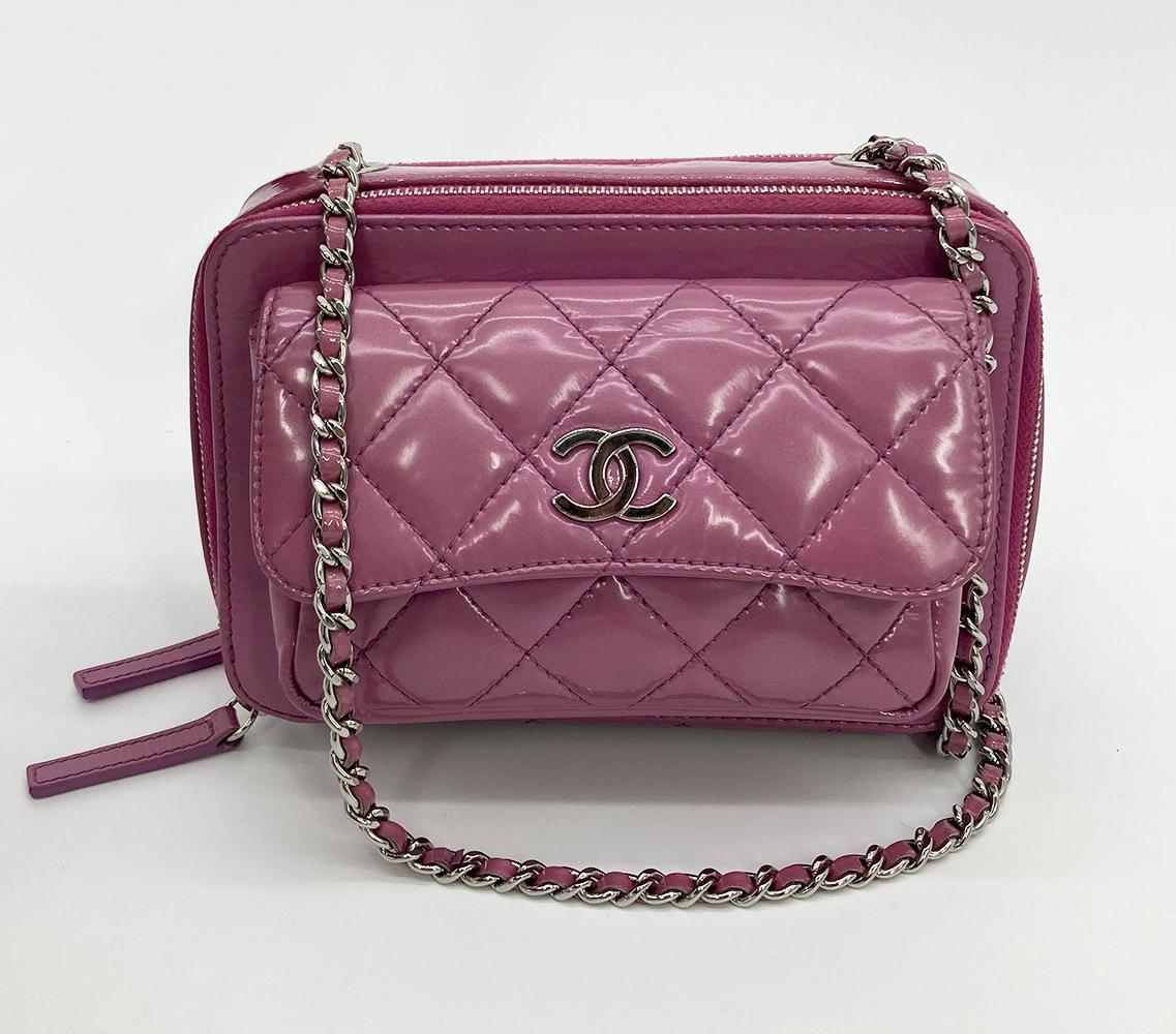 Chanel Purple Patent Pocket Box Camera Case in excellent condition. metallic Purple patent leather with quilted diamond pattern along front, back and bottom exterior. Silver hardware and signature woven chain and patent leather shoulder strap. Front