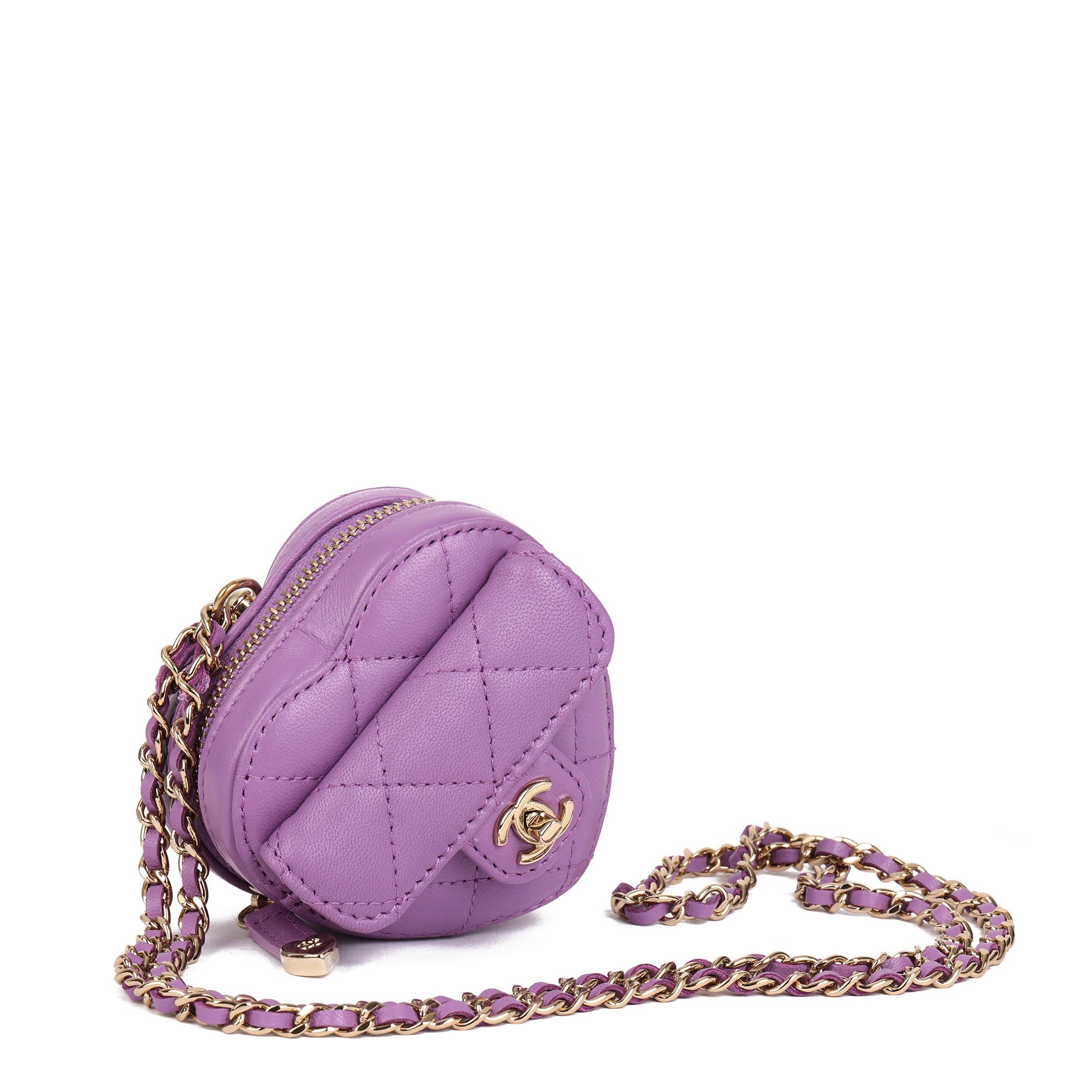 CHANEL
Purple Quilted Lambskin Micro Love Heart

Xupes Reference: CB726
Serial Number: 32050395
Age (Circa): 2022
Accompanied By: Chanel Dust Bag, Box, Authenticity Card, Care Booklet
Authenticity Details: Authenticity Card, Serial Sticker (Made in